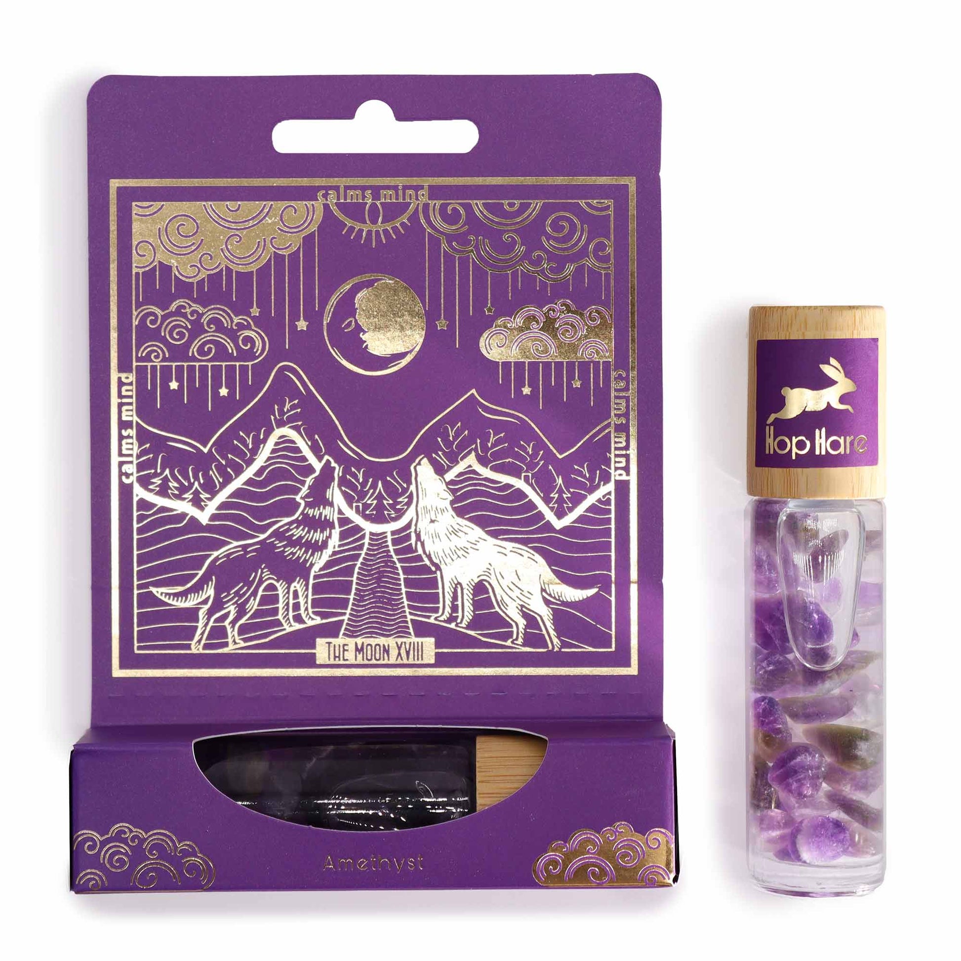 Gemstone Tarot Essential Oil Roll-On - Amethyst - The Moon with purple and gold illustrated box and purple stone-filled bottle by Quintessential Holistic Health Ltd