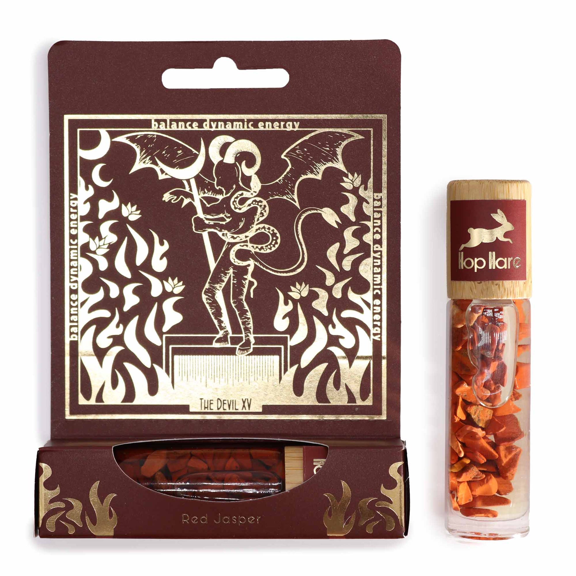 Gemstone Tarot Essential Oil Roll-On - Red Jasper - The Devil with brown and gold illustrated box and orange chip-filled bottle by Quintessential Holistic Health Ltd