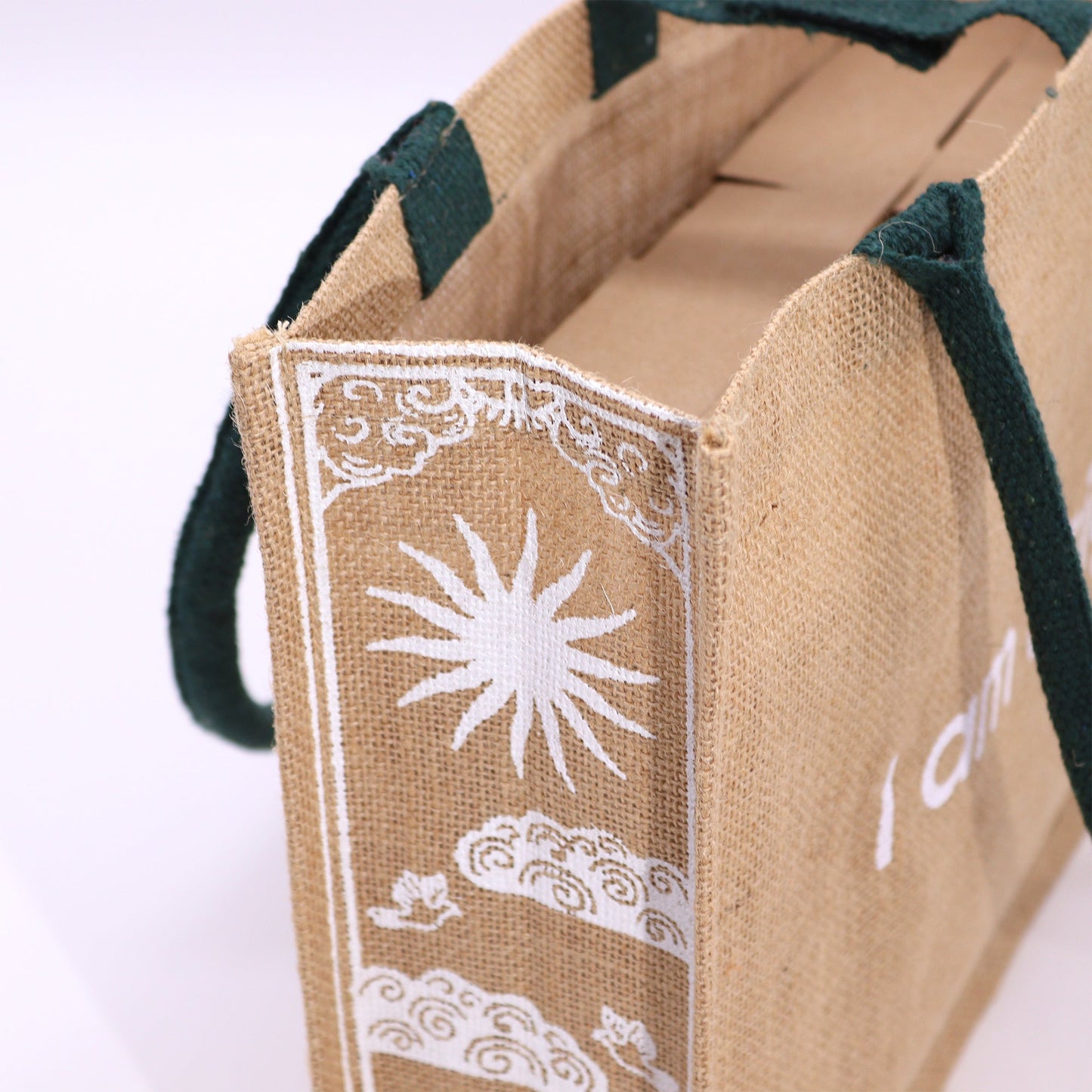 Eco-Friendly Jute Tote Bag - I Am Bright, with close-up white sun and cloud artwork on the side panel by Quintessential Holistic Health Ltd