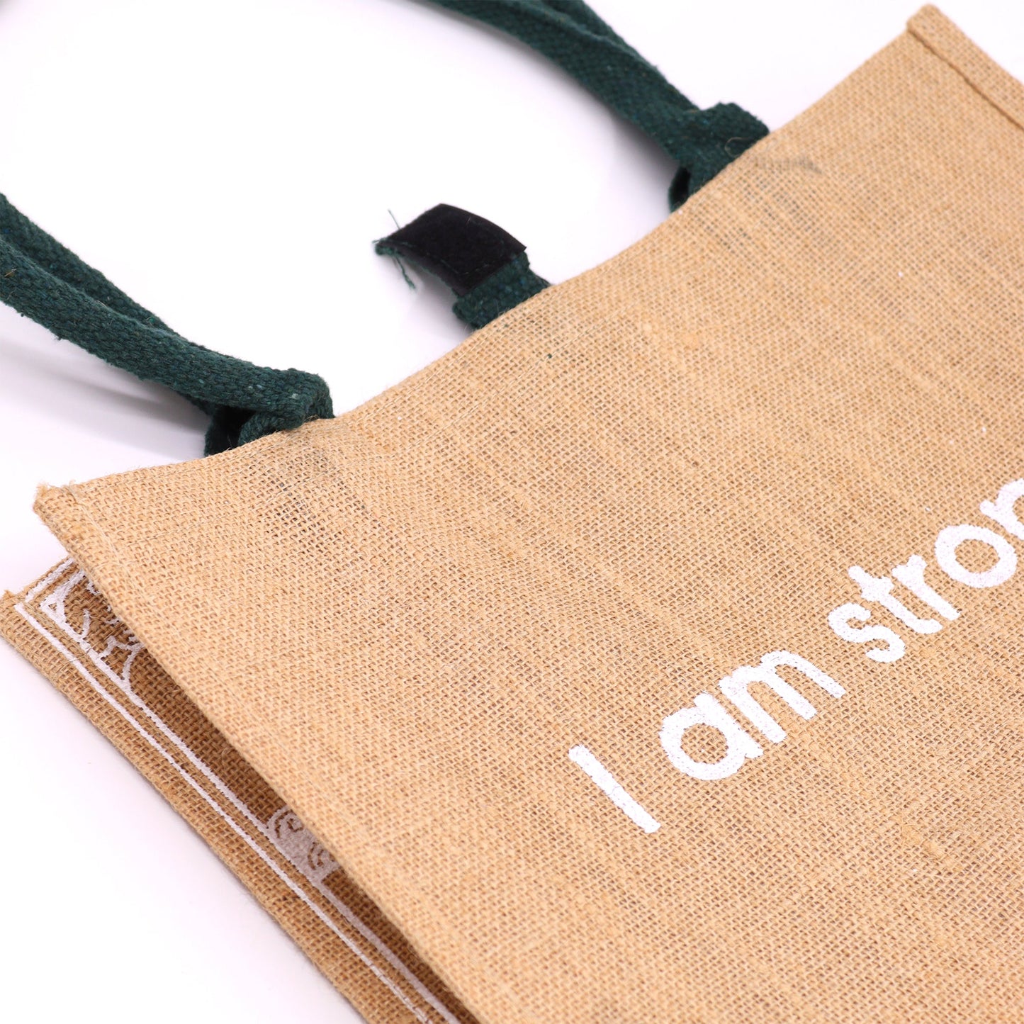 Eco-Friendly Jute Tote Bag - I Am Bright, with a close-up of the woven surface and cropped white text by Quintessential Holistic Health Ltd
