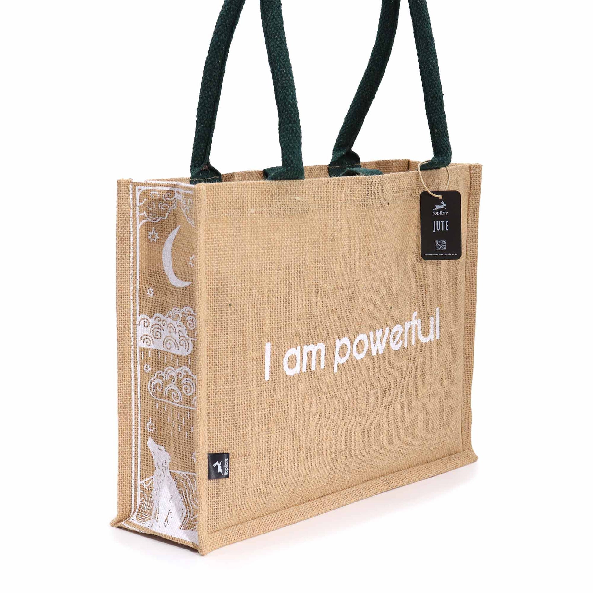 Eco-Friendly Jute Tote Bag - I Am Powerful, displaying white affirmation text and crescent moon side artwork by Quintessential Holistic Health Ltd