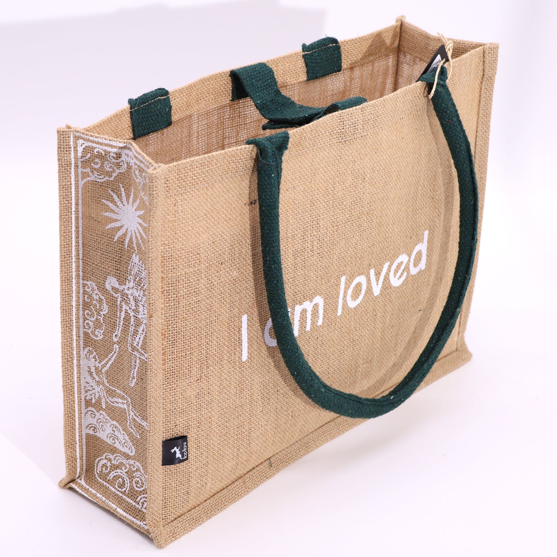 Eco-Friendly Jute Tote Bag - I Am Loved, showing white affirmation text and a decorative illustrated side panel by Quintessential Holistic Health Ltd