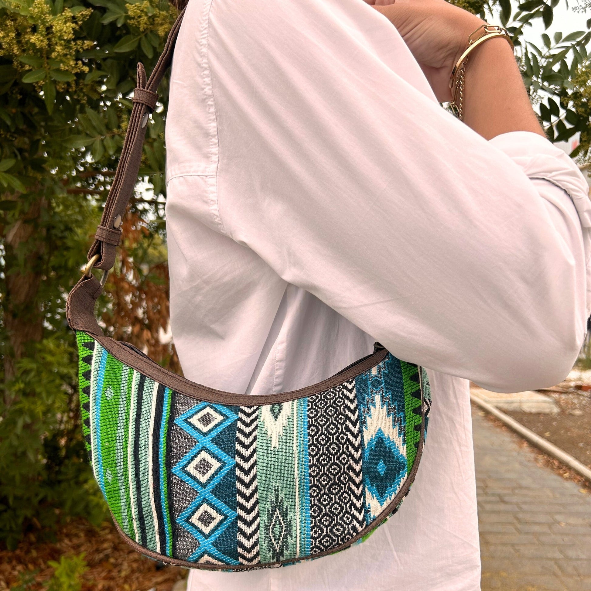 Handmade Jacquard Hobo Bag - Bold Greens product packaging on clean background from Quintessential Holistic Health Ltd