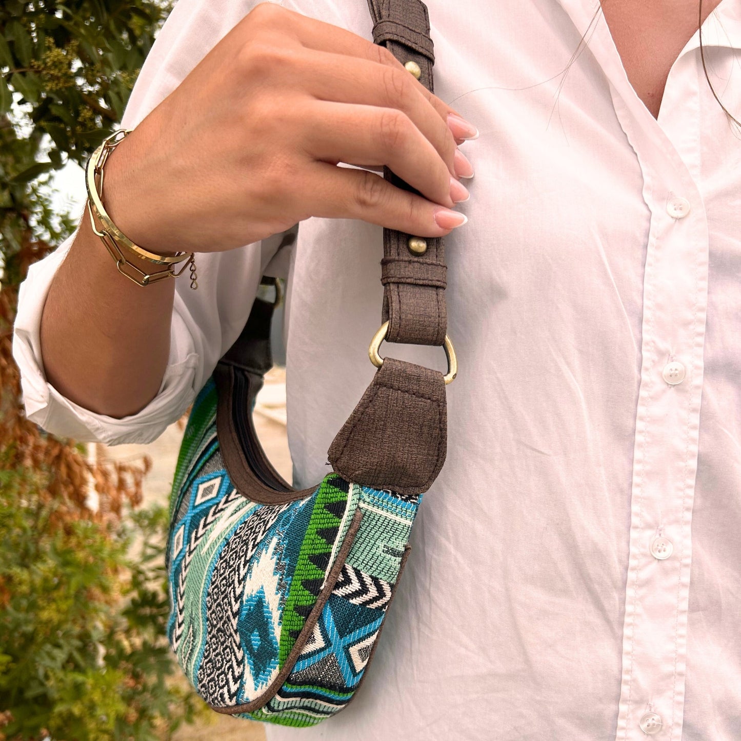 Handmade Jacquard Hobo Bag - Bold Greens product packaging on clean background from Quintessential Holistic Health Ltd