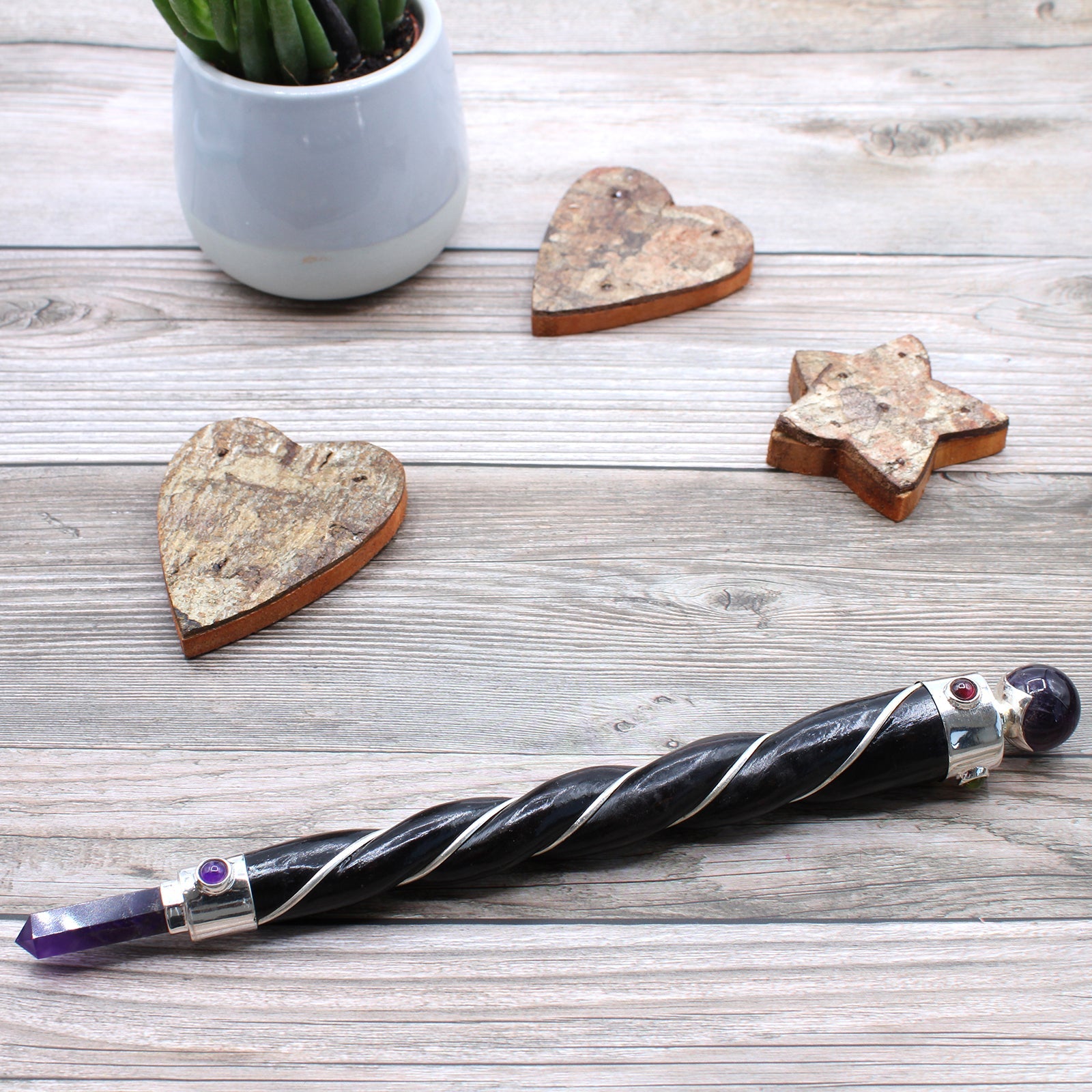 Handmade Twisted Teak Wooden Healing Wand - Silver Amethyst Gemstone product packaging on clean background from Quintessential Holistic Health Ltd