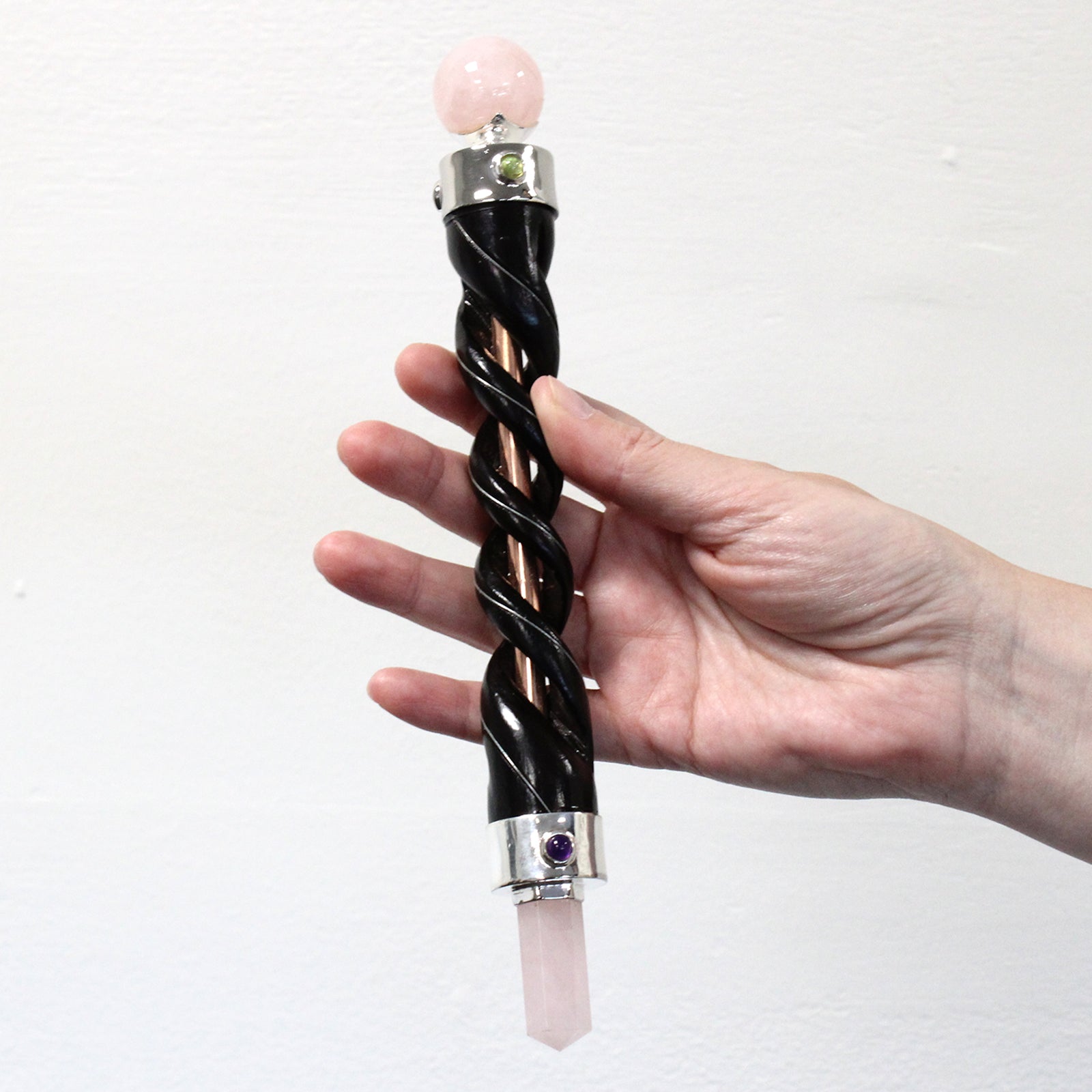 Handmade Spiral Teak Wooden Healing Wand with Copper - Rose Quartz Gemstones product packaging on clean background from Quintessential Holistic Health Ltd