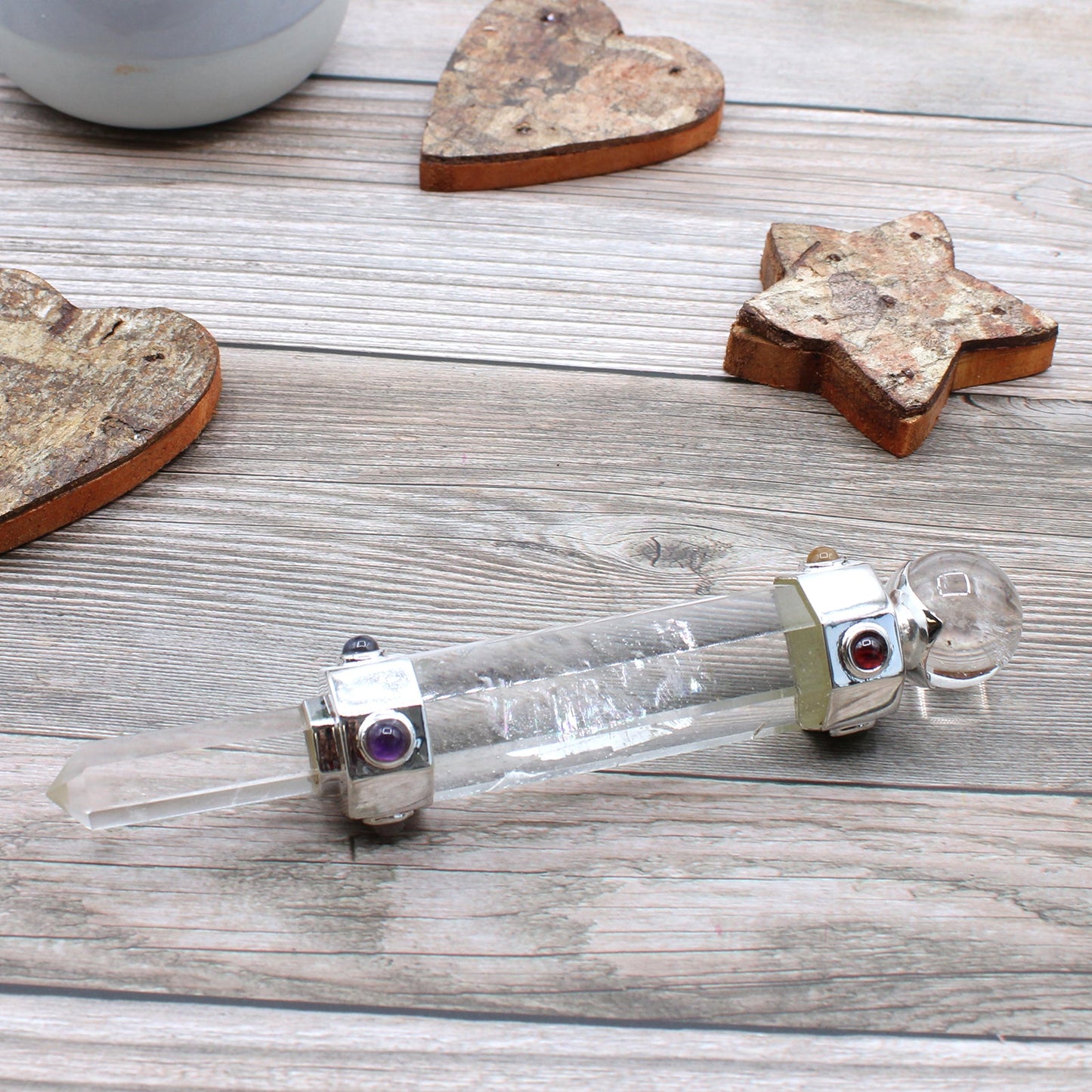 Handmade Hexagonal Healing Wand - Rock Quartz Gemstone product packaging on clean background from Quintessential Holistic Health Ltd