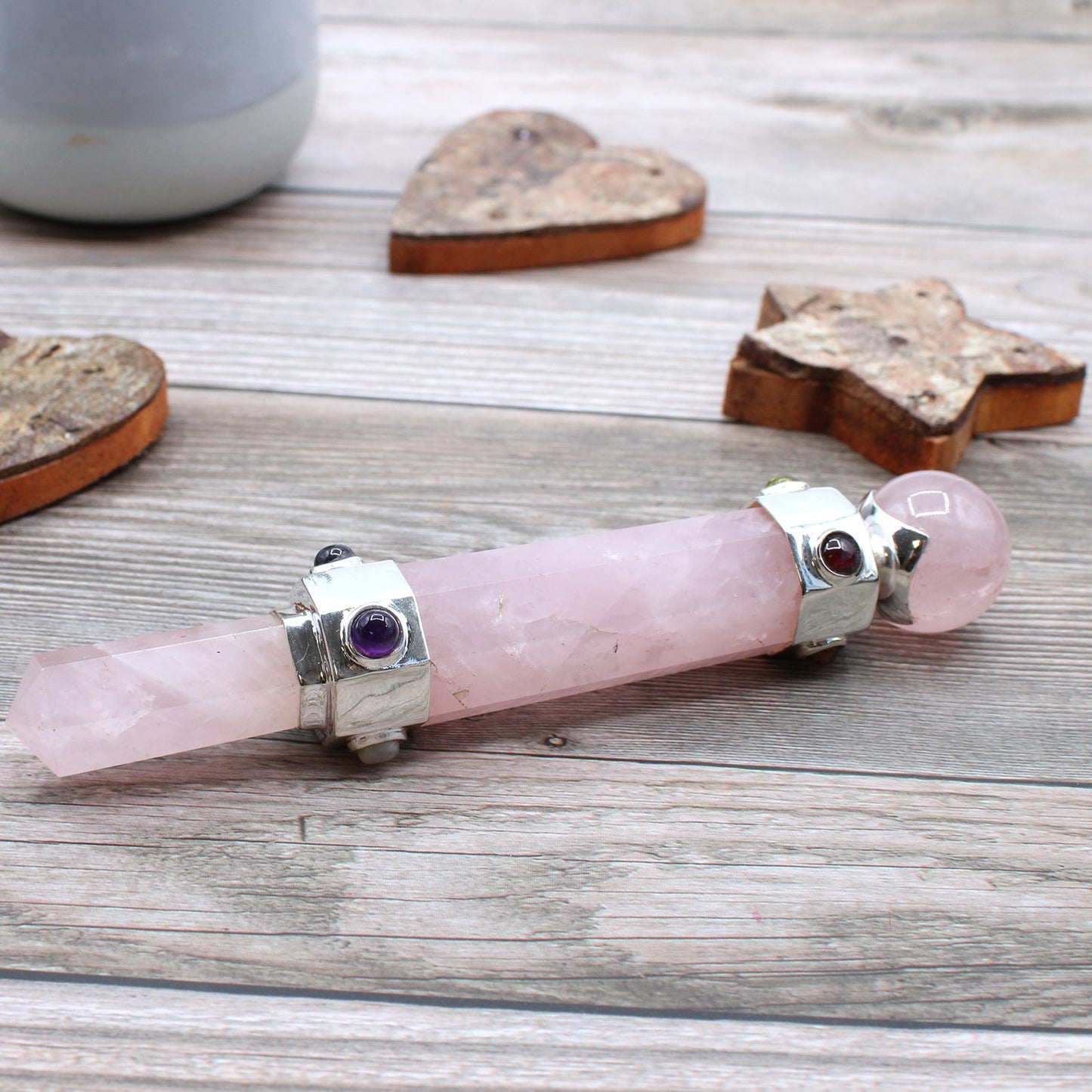 Handmade Hexagonal Healing Wand - Rose Quartz Gemstone product packaging on clean background from Quintessential Holistic Health Ltd