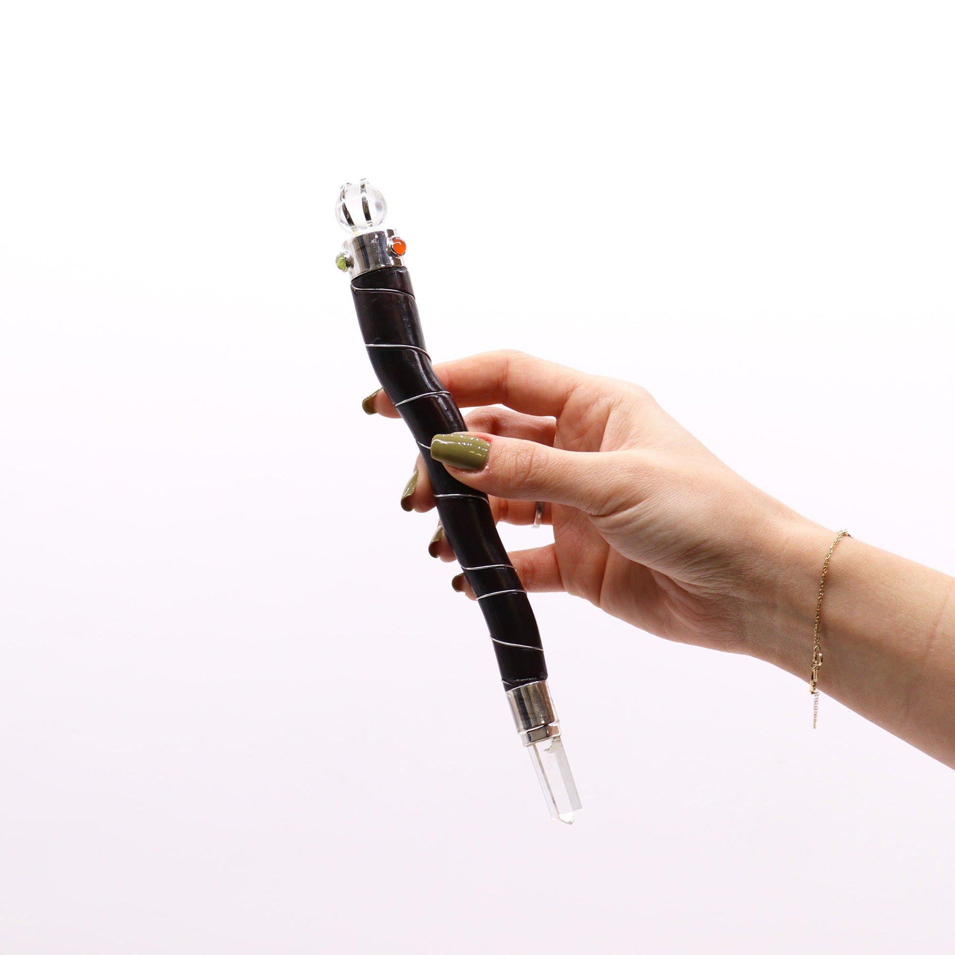 Handmade Curved Teak Wooden Healing Wand - Rock Quartz Gemstone product packaging on clean background from Quintessential Holistic Health Ltd
