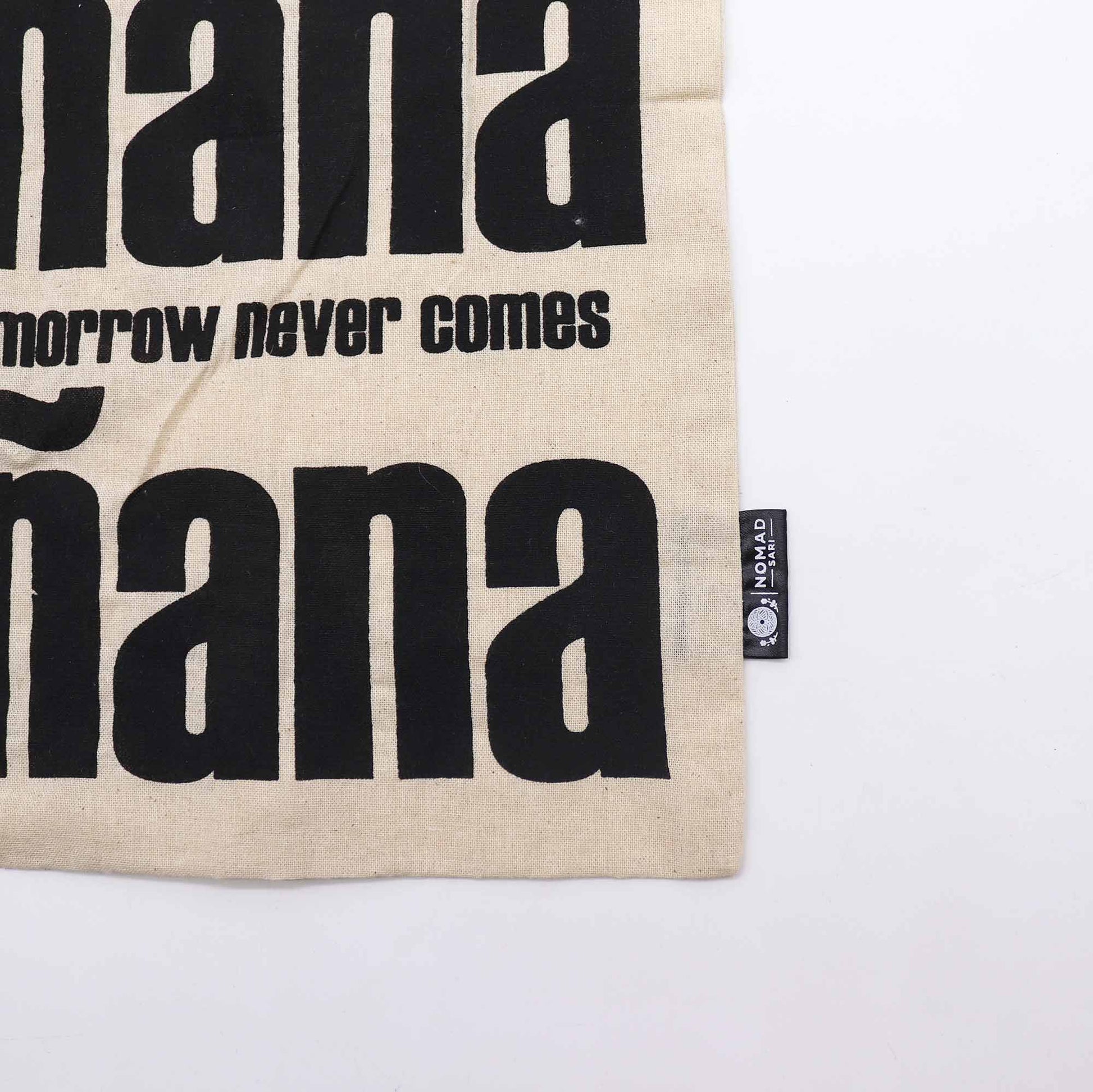 Iconic Natural Cotton Tote Bag - Mañana Mañana - Natural, close-up of bold Mañana lettering, small text and side label by Quintessential Holistic Health Ltd