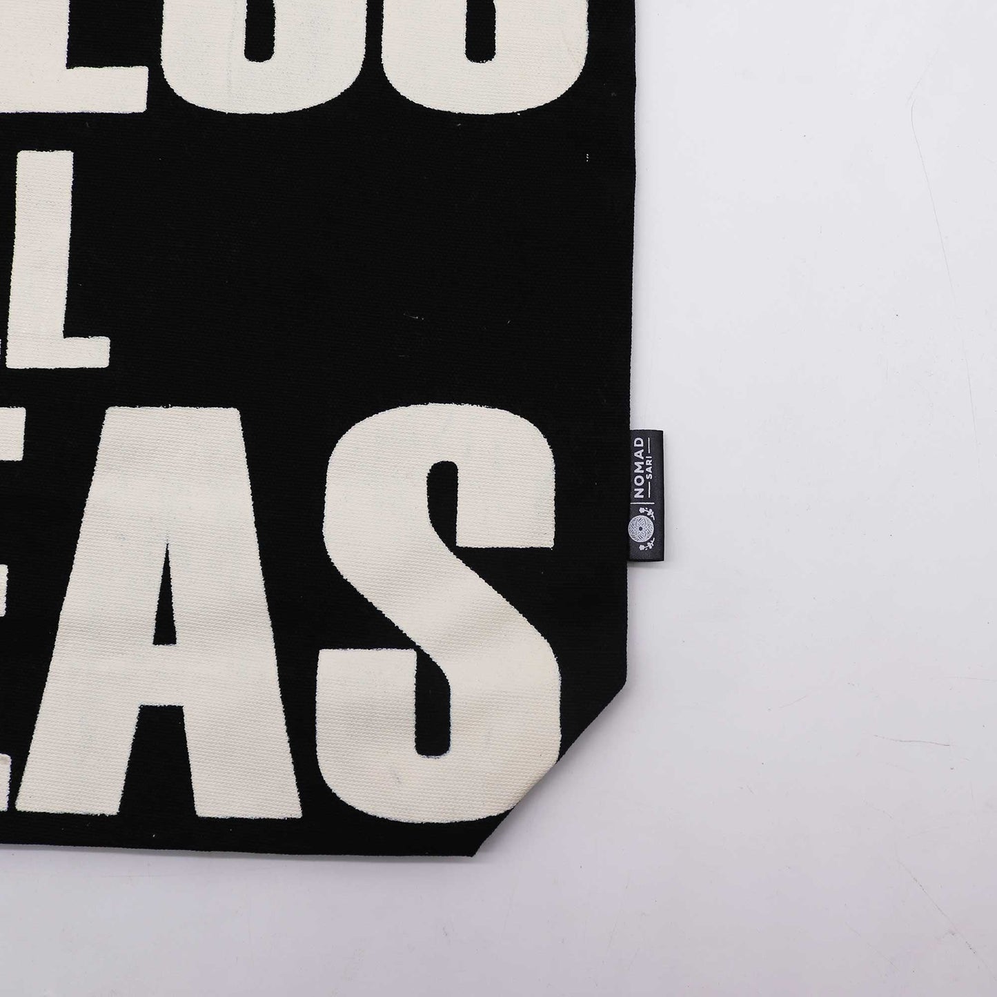 Iconic Cotton Classic Tote Bag - Access All Areas - Black & Natural, close-up of cream lettering, lower corner and side label by Quintessential Holistic Health Ltd