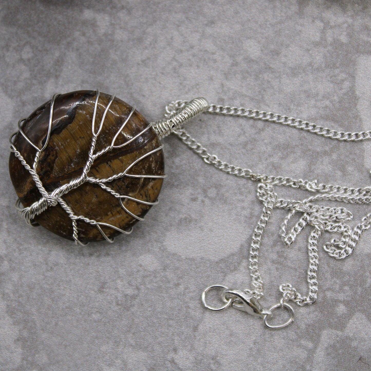 Tree of Life Gemstone Necklace - Tigers Eye product packaging on clean background from Quintessential Holistic Health Ltd