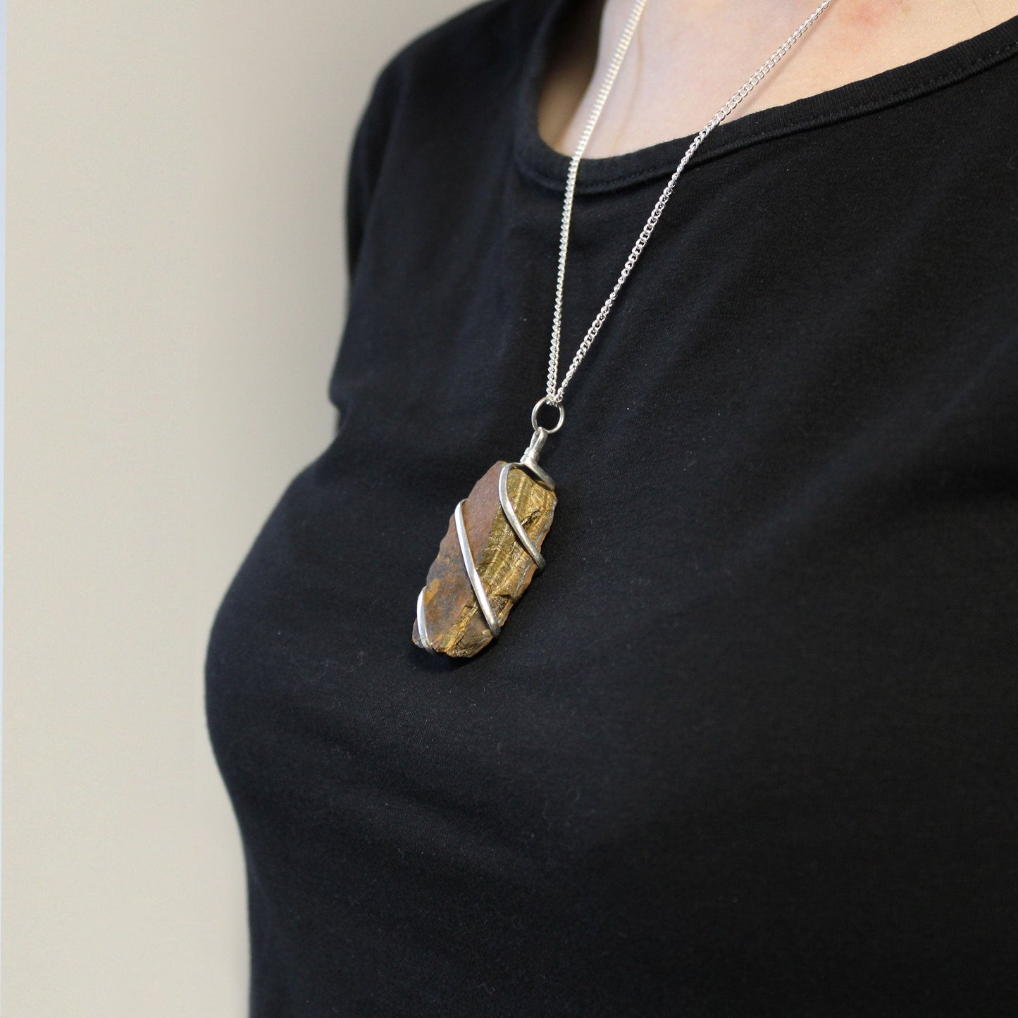 Cascade Wrapped Gemstone Necklace - Rough Tigers Eye product packaging on clean background from Quintessential Holistic Health Ltd