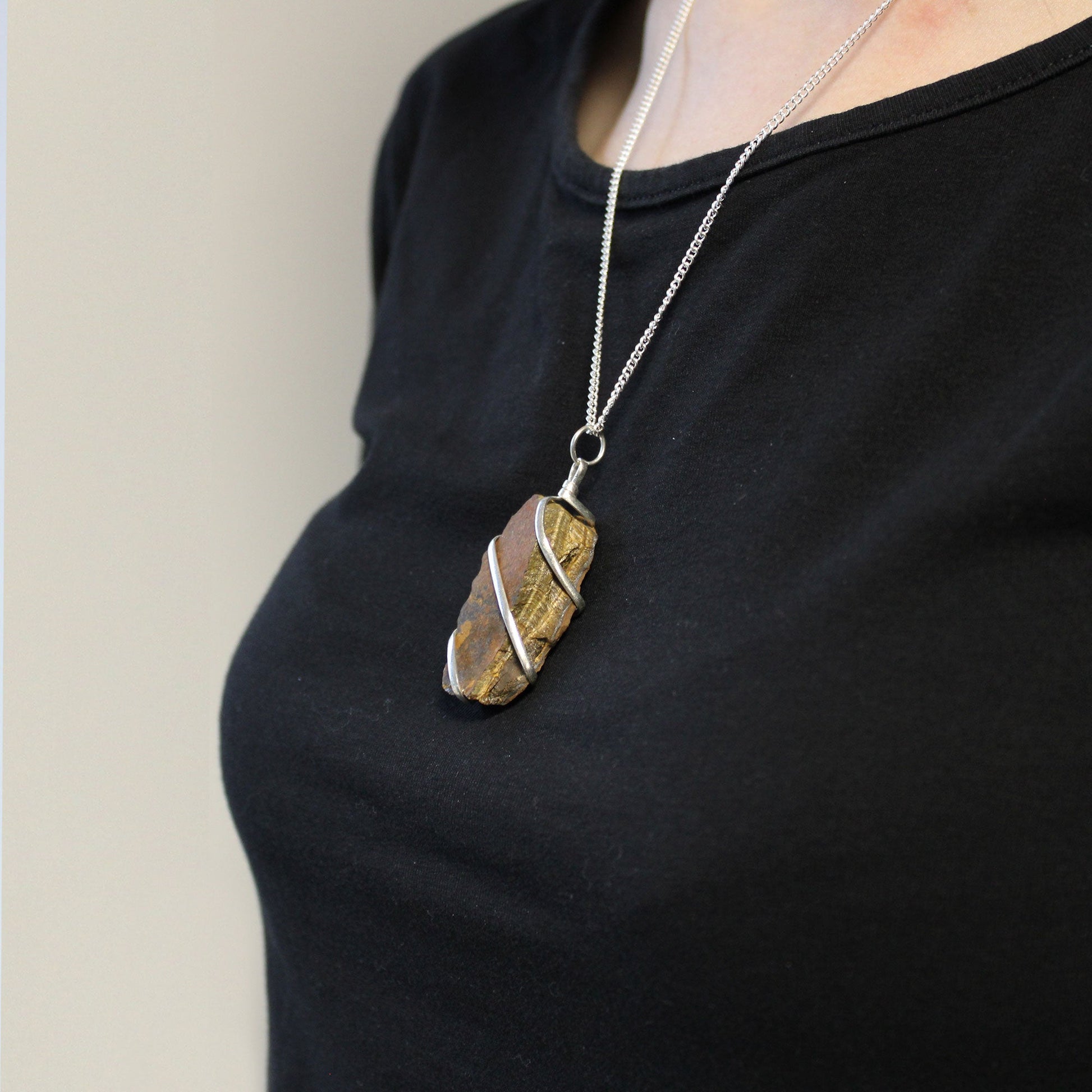 Cascade Wrapped Gemstone Necklace - Rough Tigers Eye product packaging on clean background from Quintessential Holistic Health Ltd