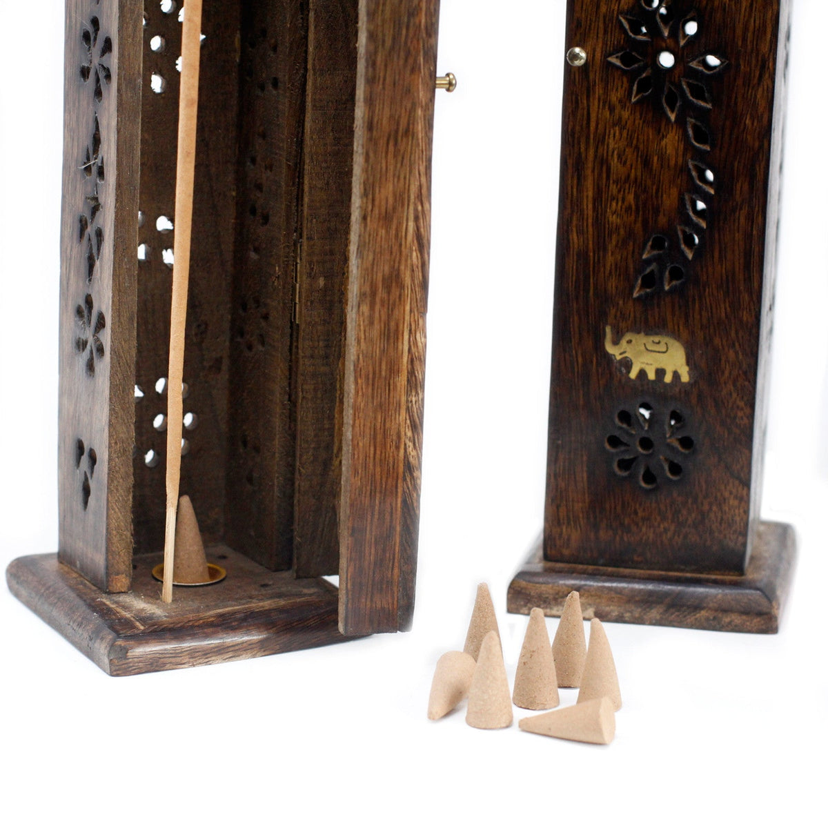Mango Wood Square Incense Tower with Brass Inlay shown open beside a closed tower with floral cutouts and several cones by Quintessential Holistic Health Ltd
