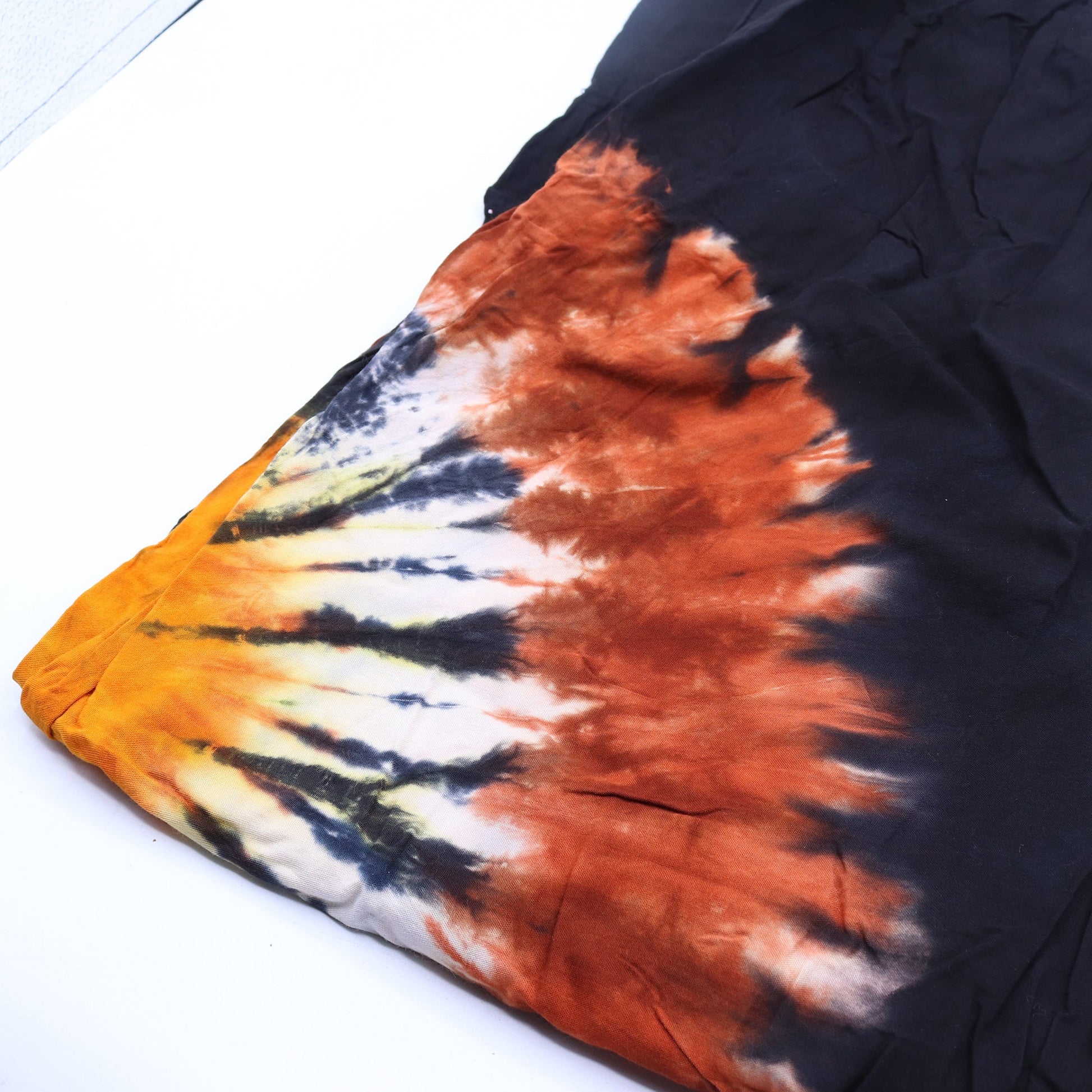Japanese Style Unisex Tie Dyed Lounge Pants - Medium / Black, Chocolate and Orange product packaging on clean background from Quintessential Holistic Health Ltd