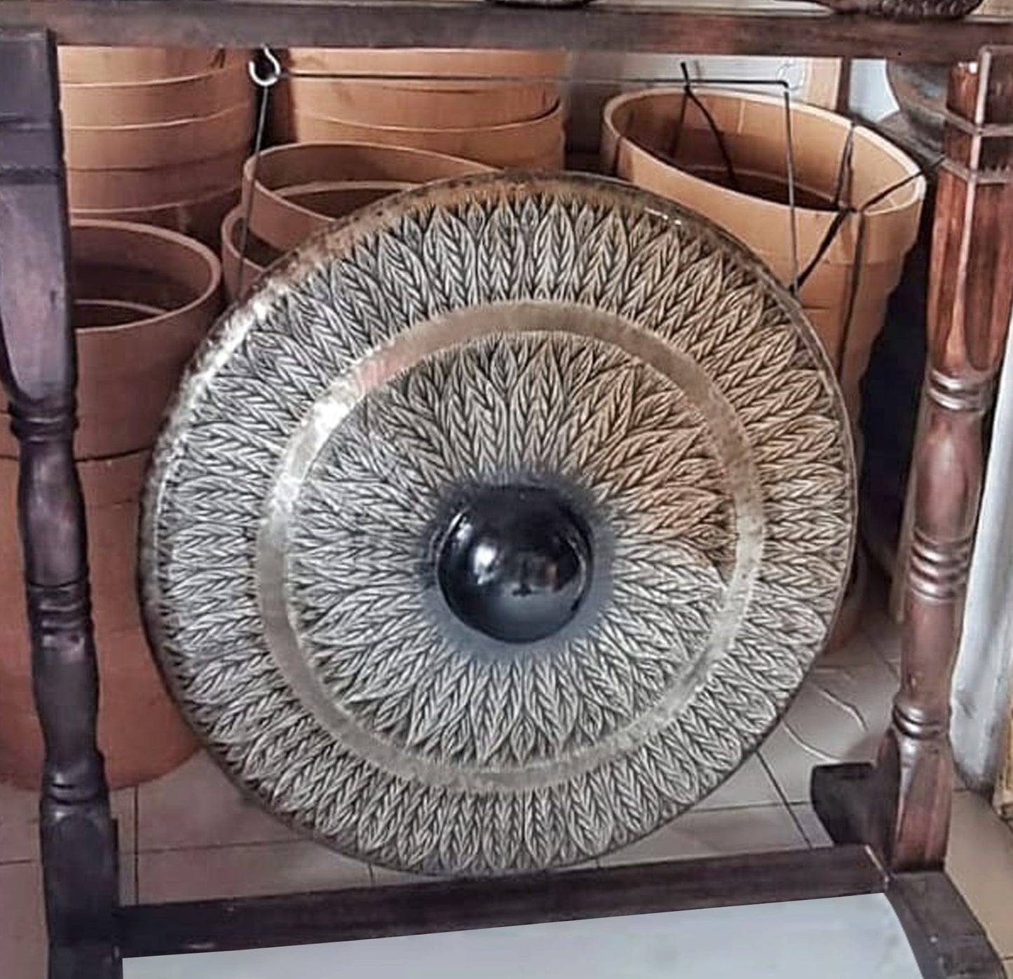 Handmade Albasia Wooden and Metal Healing Gong Extra Large 80cm / Black Patterned / Antique Brown Stand product packaging on clean background from Quintessential Holistic Health Ltd