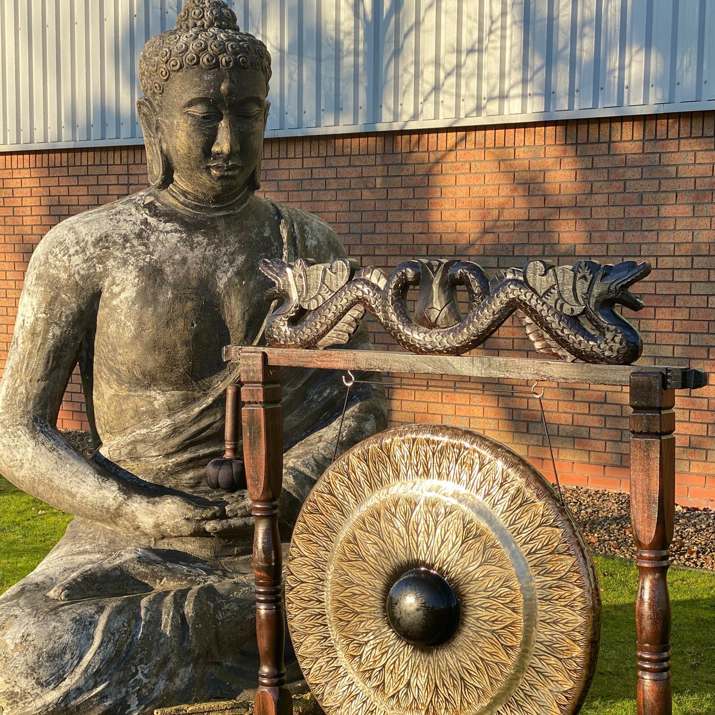 Handmade Albasia Wooden and Metal Healing Gong Extra Large 80cm / Black Patterned / Antique Brown Stand product packaging on clean background from Quintessential Holistic Health Ltd