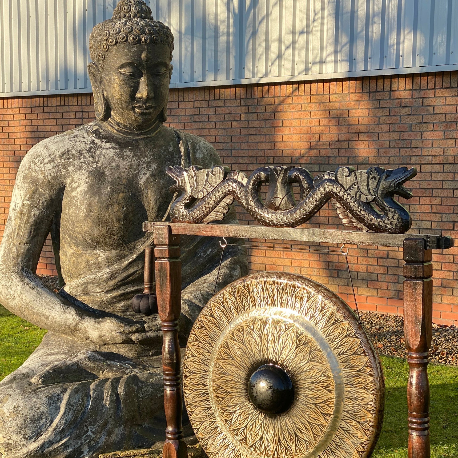 Handmade Albasia Wooden and Metal Healing Gong Extra Large 80cm / Black Patterned / Antique Brown Stand product packaging on clean background from Quintessential Holistic Health Ltd