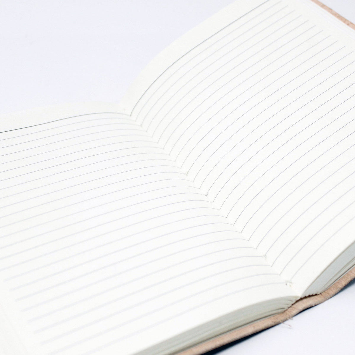 Leather-Bound Notebook - Medium Brown, Moonstone Gemstone, open to lined cream pages with part of the brown cover visible by Quintessential Holistic Health Ltd