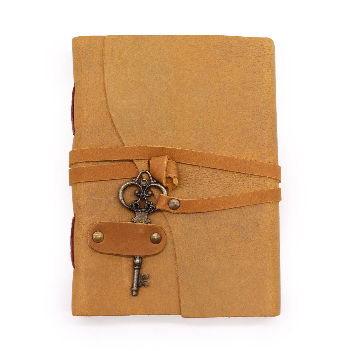 Oiled Leather 200-Page Notebook with Strap & Key – Medium Tan standing closed with a wraparound strap and metal key charm by Quintessential Holistic Health Ltd