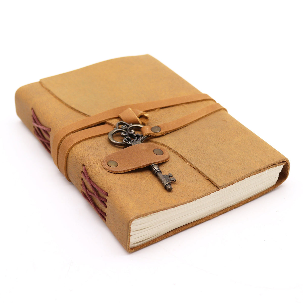 Oiled Leather 200-Page Notebook with Strap & Key – Medium Tan lying closed with stitched binding, wraparound strap and key charm by Quintessential Holistic Health Ltd