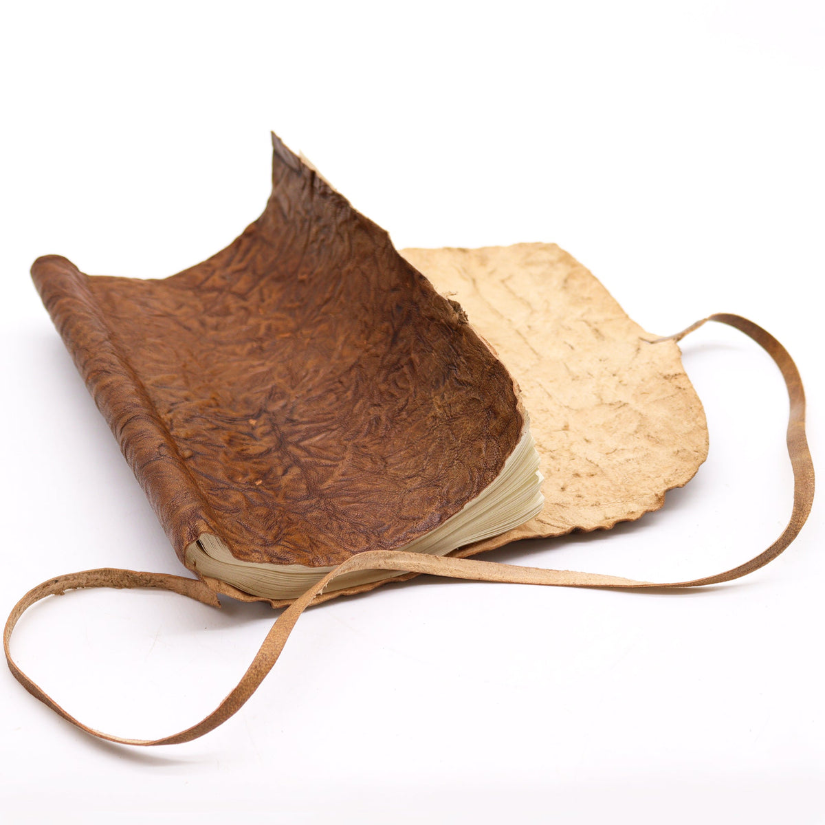 Handmade Rolled Leather Travel Notebook with Strap - Natural, open with a rich brown textured inner cover and pale outer cover by Quintessential Holistic Health Ltd