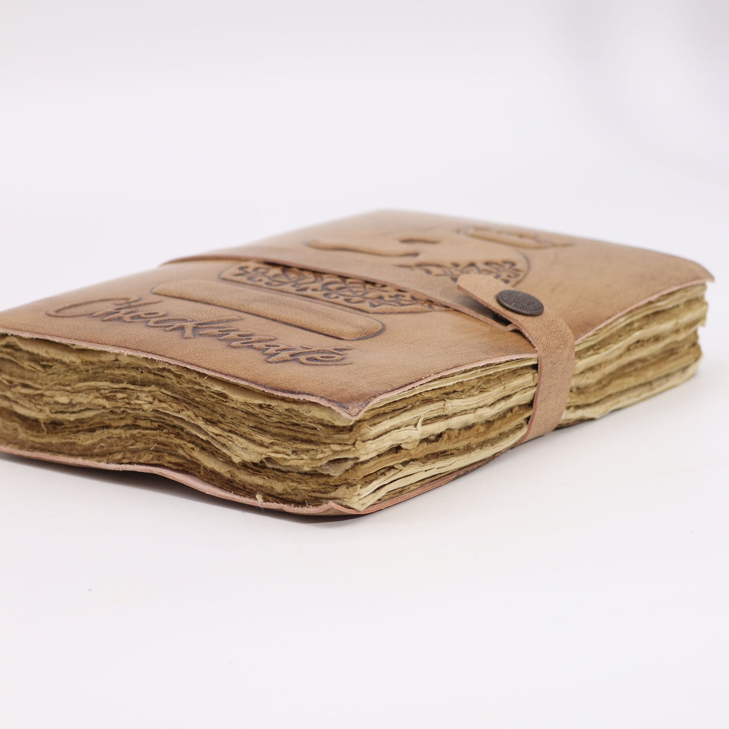 Handmade Leather-Bound Eco-Friendly Deckle - Large - Tan - Checkmate, closed tan journal with a fastening strap and thick rough-edged pages, by Quintessential Holistic Health Ltd