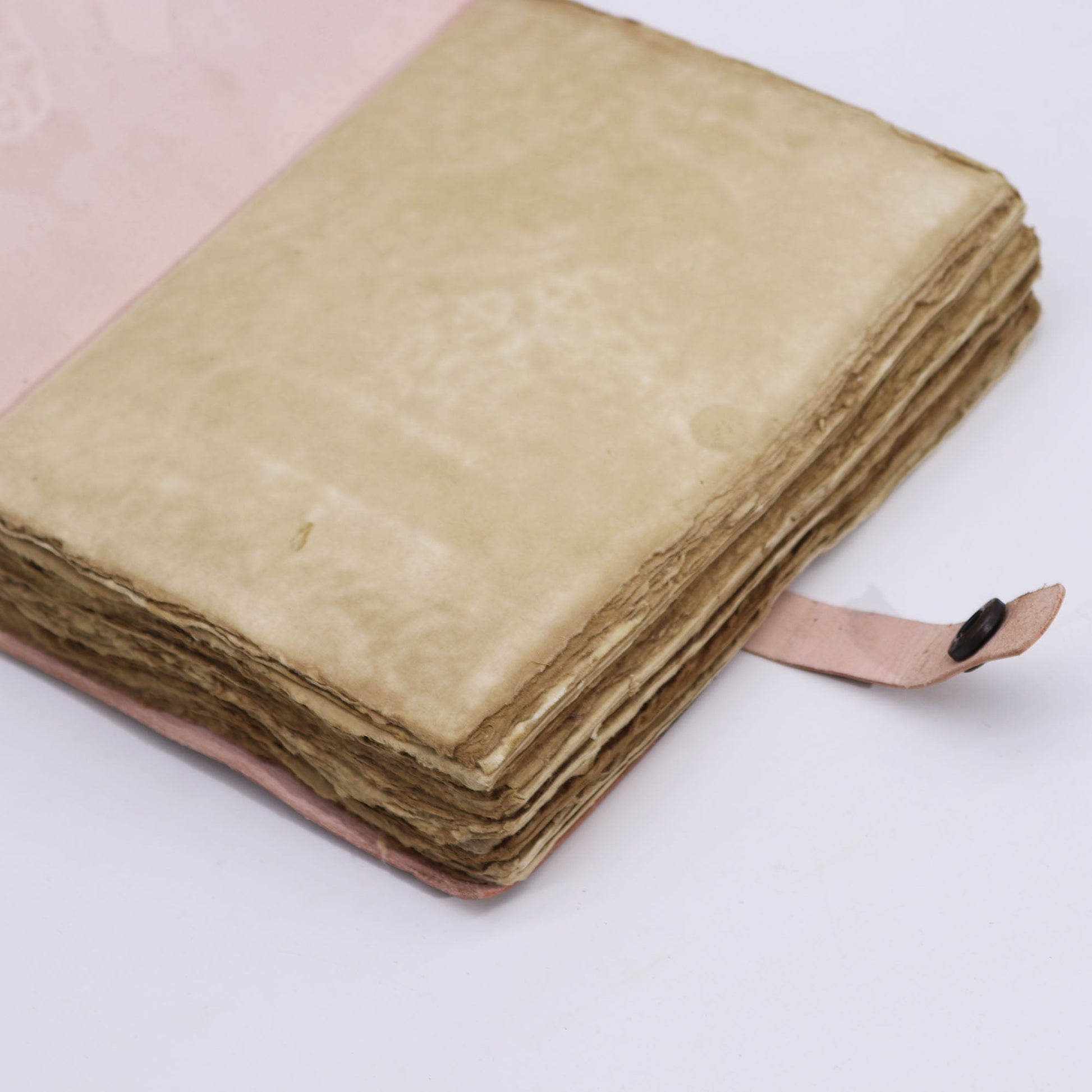 Handmade Leather-Bound Eco-Friendly Deckle - Large - Tan - Checkmate, open journal with blank rough-edged pages and a tan tie, by Quintessential Holistic Health Ltd
