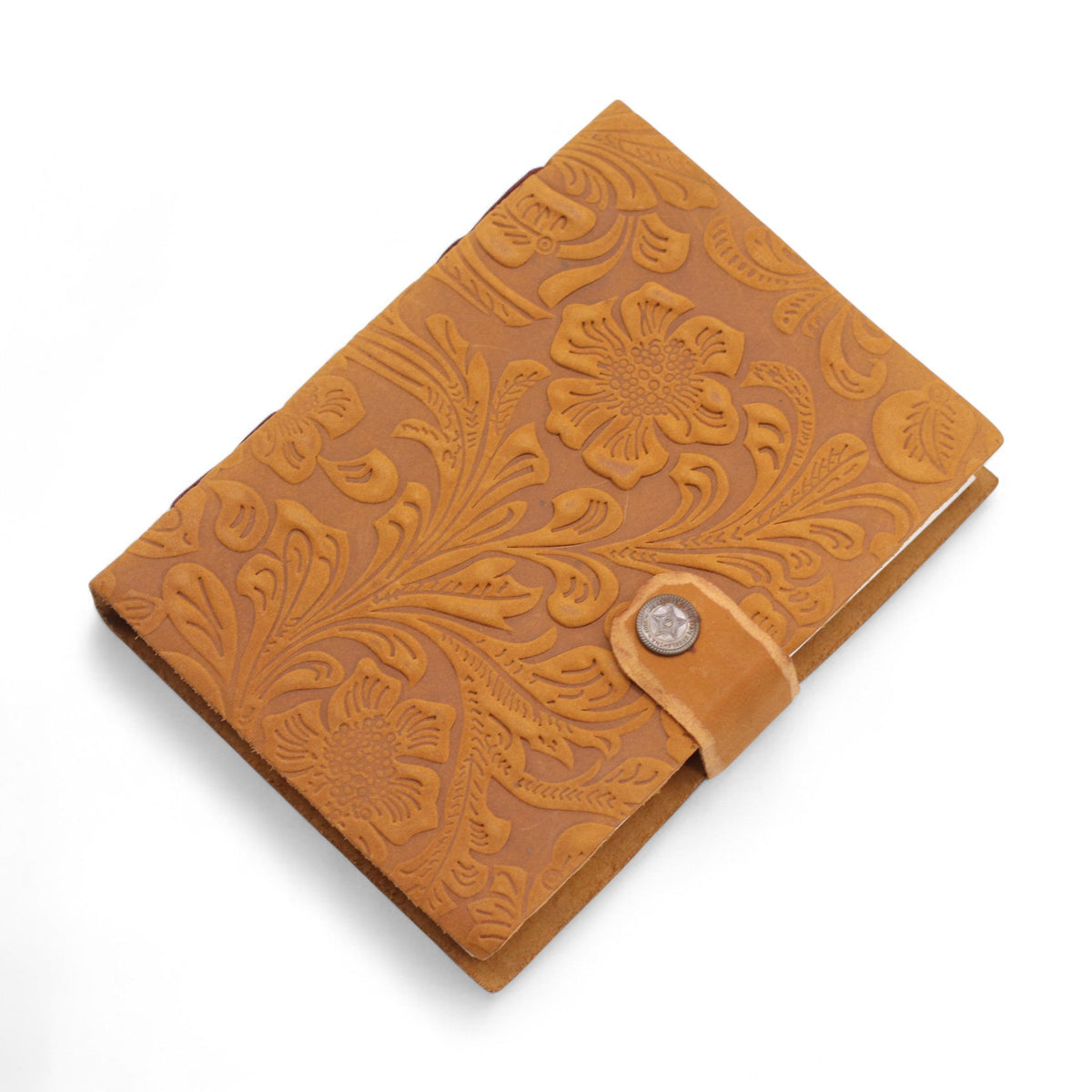 Leather-Bound Floral Notebook - Medium Tan, Strap, 200 Pages lying closed with embossed floral pattern and round stud fastening by Quintessential Holistic Health Ltd