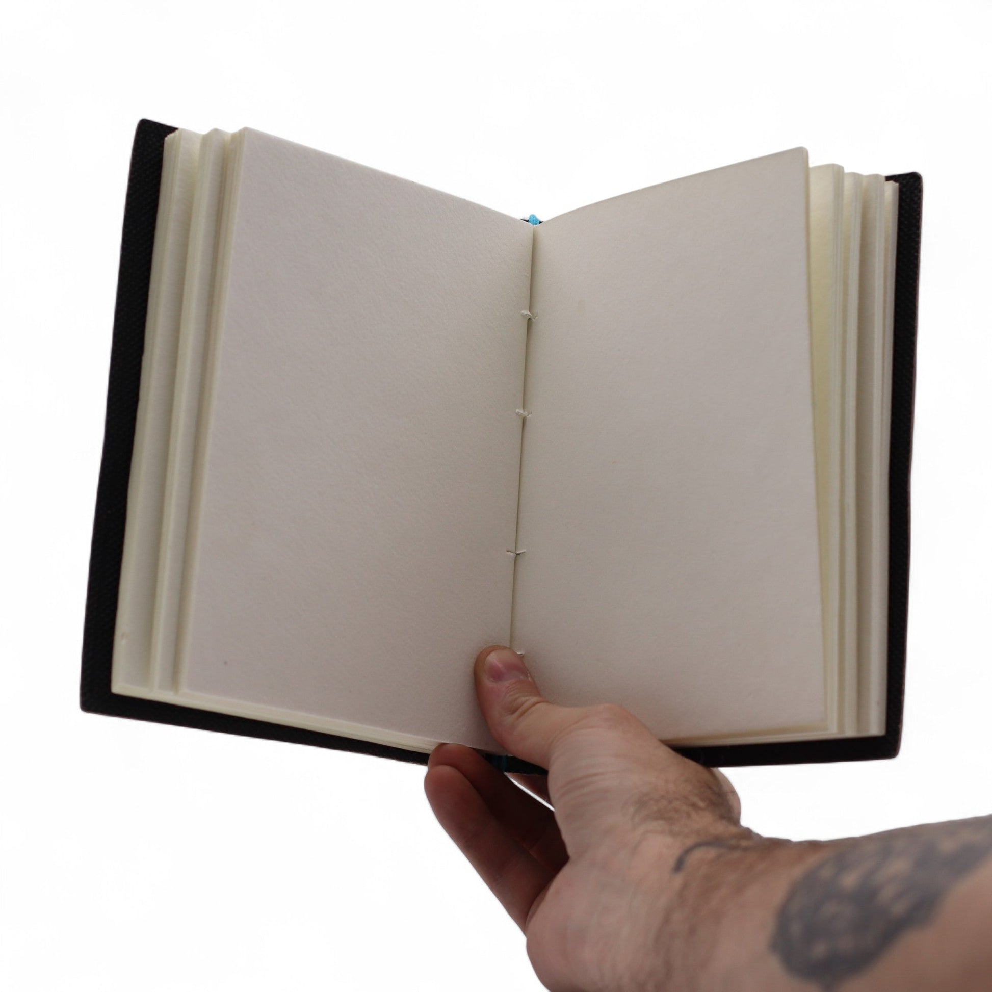 Handmade Leather-Bound Eco-Friendly Journal with Wrap – My Chakras Are Aligned AF product packaging on clean background from Quintessential Holistic Health Ltd