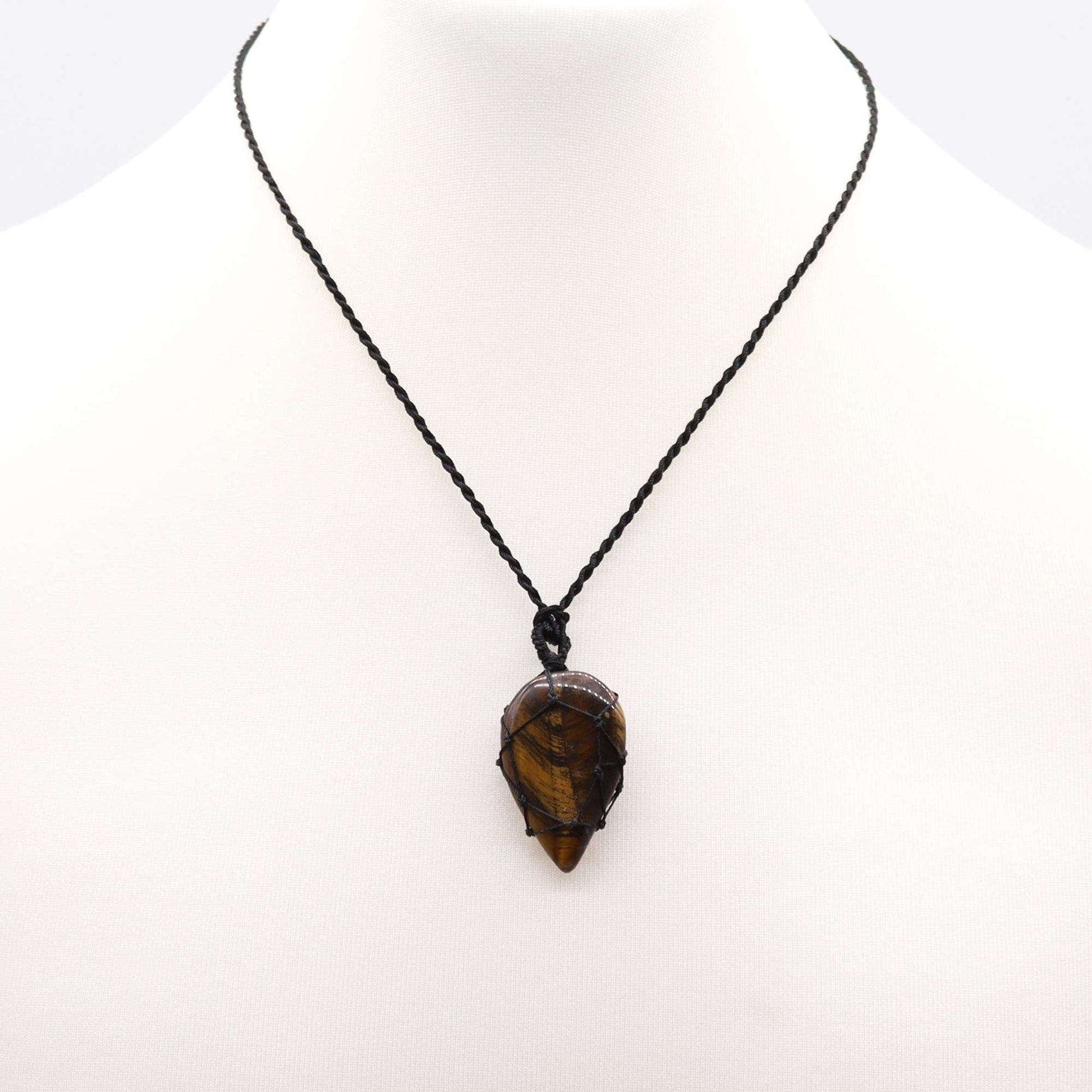 Handmade Laced Gemstone Pendant - Teardrop / Tigers Eye product packaging on clean background from Quintessential Holistic Health Ltd