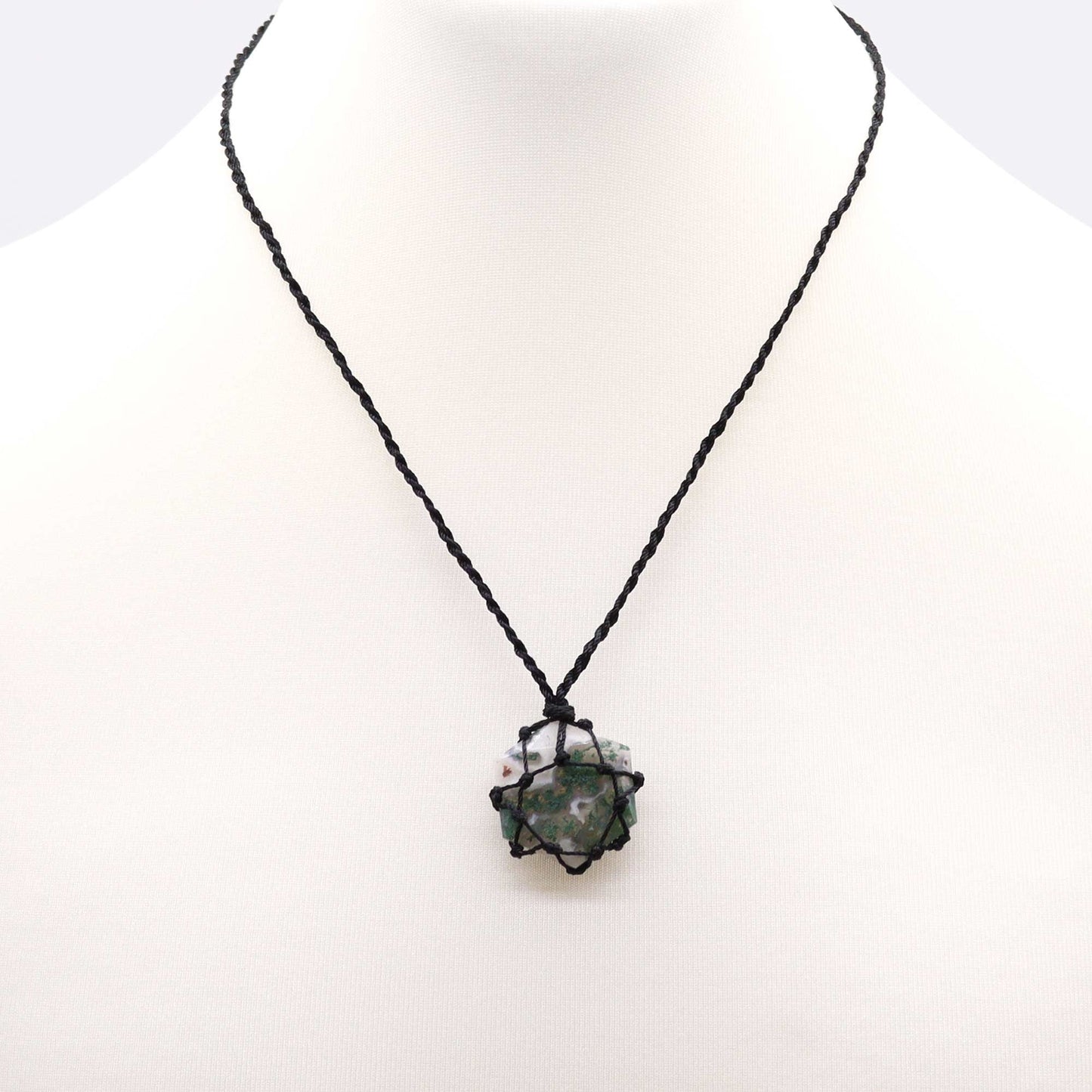 Handmade Laced Gemstone Pendant - Hexagonal / Moss Agate product packaging on clean background from Quintessential Holistic Health Ltd