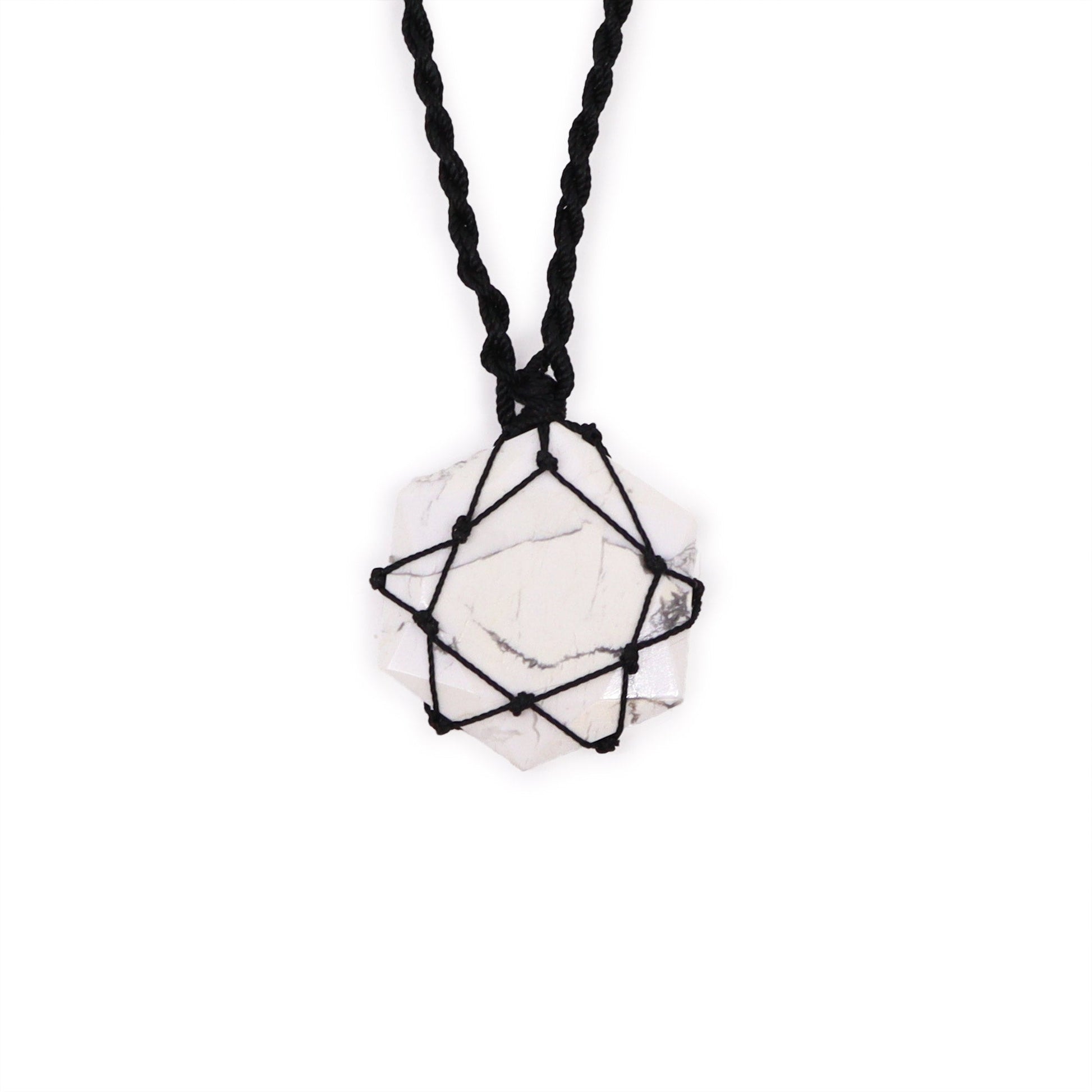 Handmade Laced Gemstone Pendant - Hexagonal / White Howlite product packaging on clean background from Quintessential Holistic Health Ltd