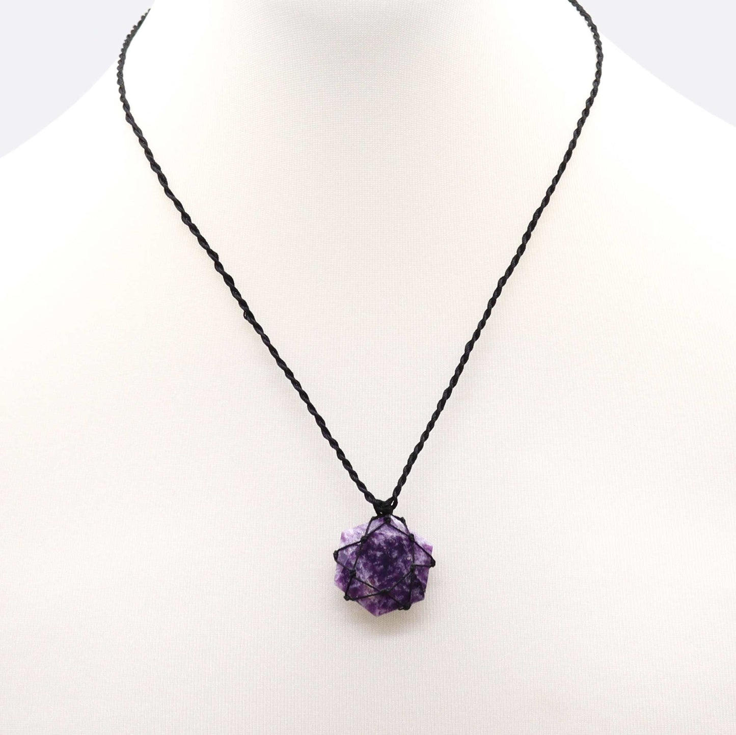 Handmade Laced Gemstone Pendant - Hexagonal / Lepidolite product packaging on clean background from Quintessential Holistic Health Ltd