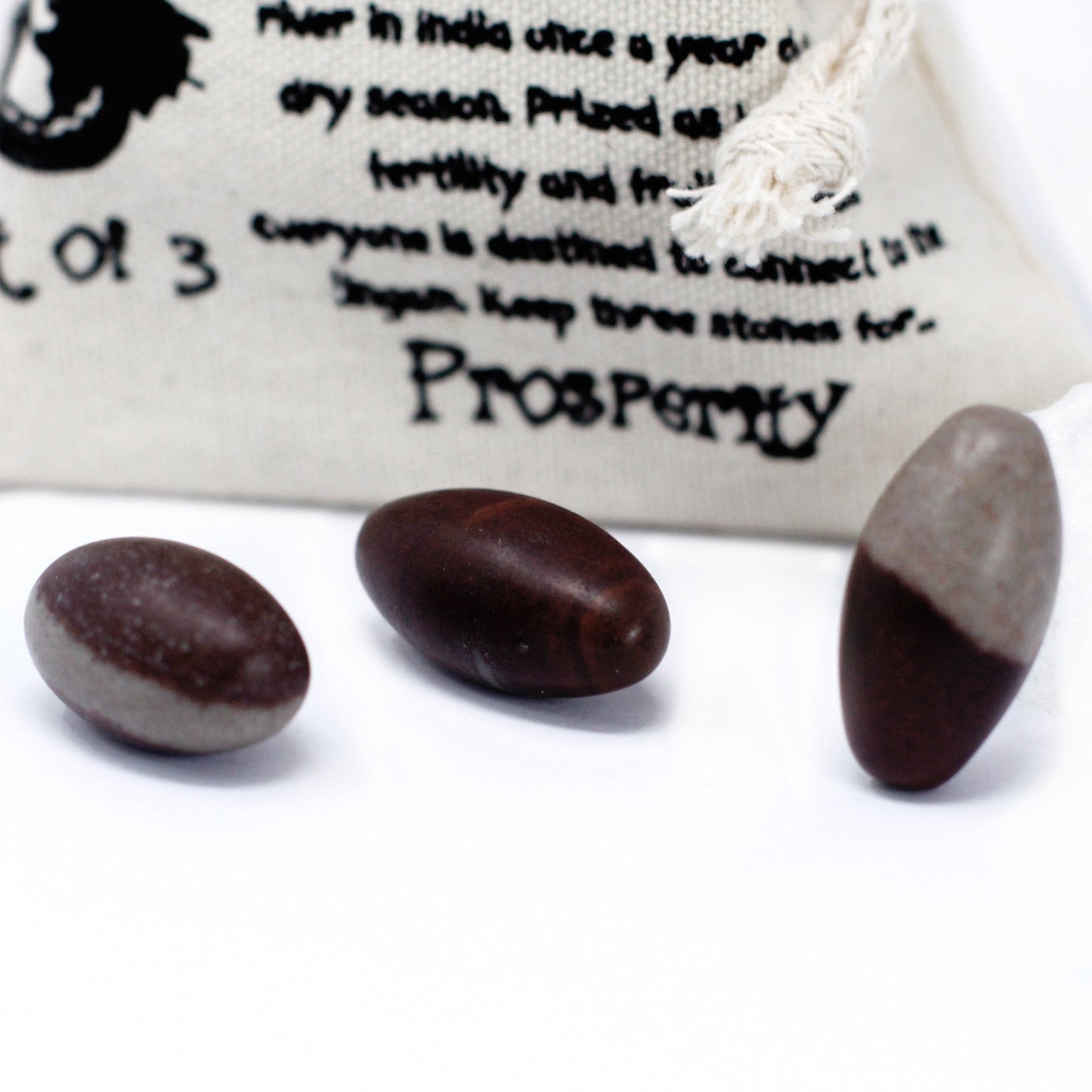 3 x Shiva Lingam Egg Shaped Stones - Extra Small product packaging on clean background from Quintessential Holistic Health Ltd