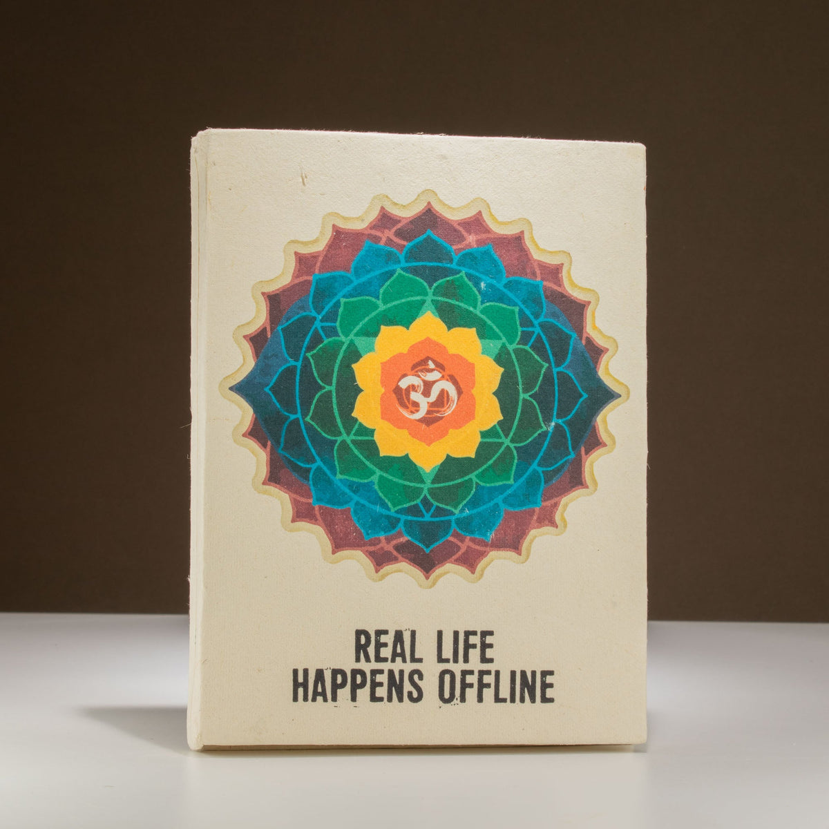 A5 Lokta Paper Journal & Bookmark - Real Life Happens Offline with a layered turquoise, orange, green and purple mandala by Quintessential Holistic Health Ltd