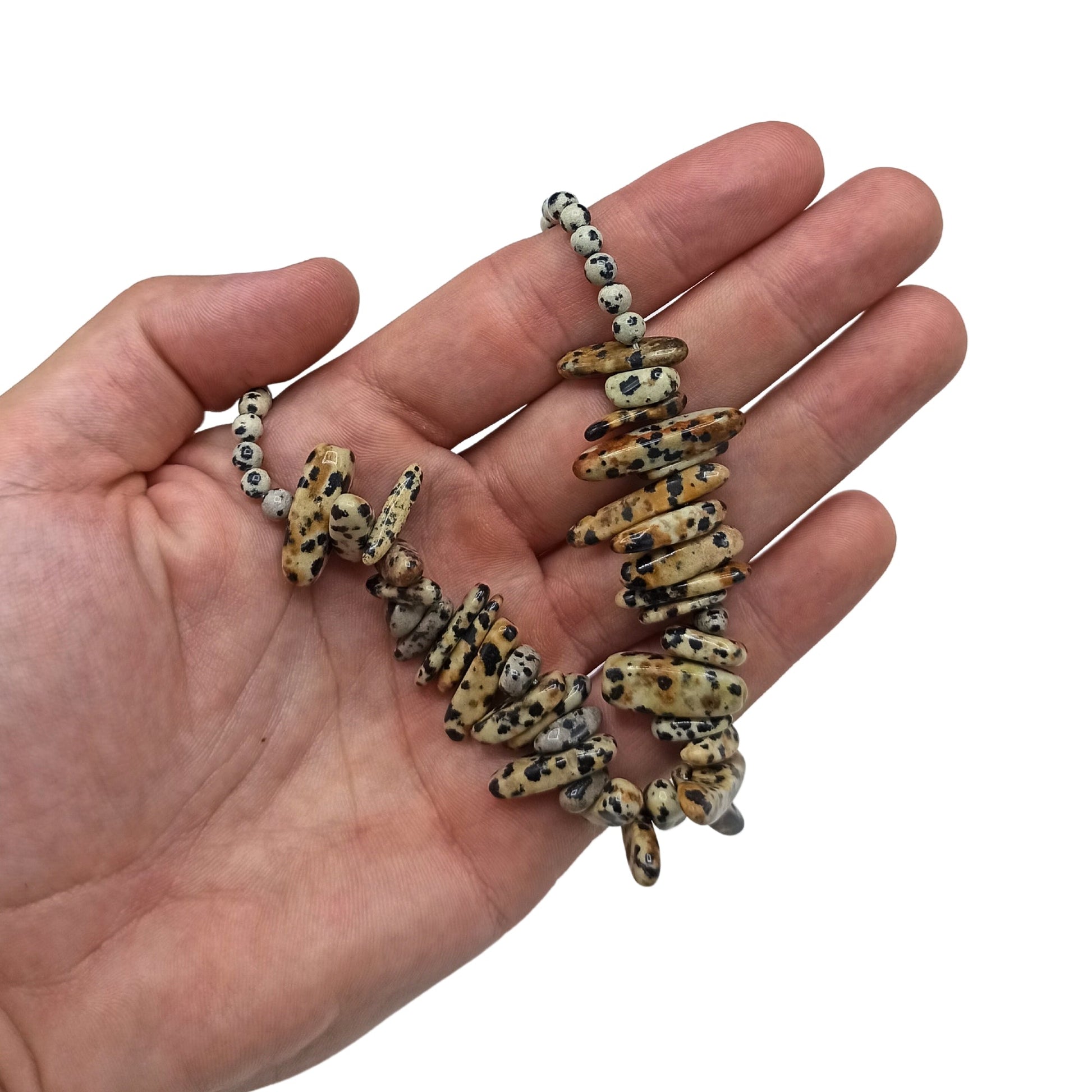 Longstone Gem Necklace - Dalmatian Stone product packaging on clean background from Quintessential Holistic Health Ltd