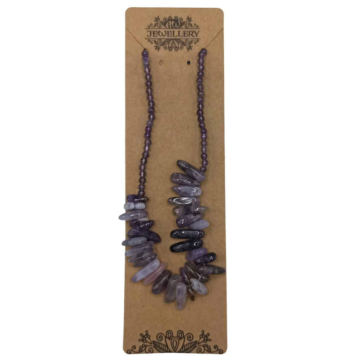 Longstone Gem Necklace - Amethyst hanging from a brown display card with purple beads and clustered irregular stone drops by Quintessential Holistic Health Ltd