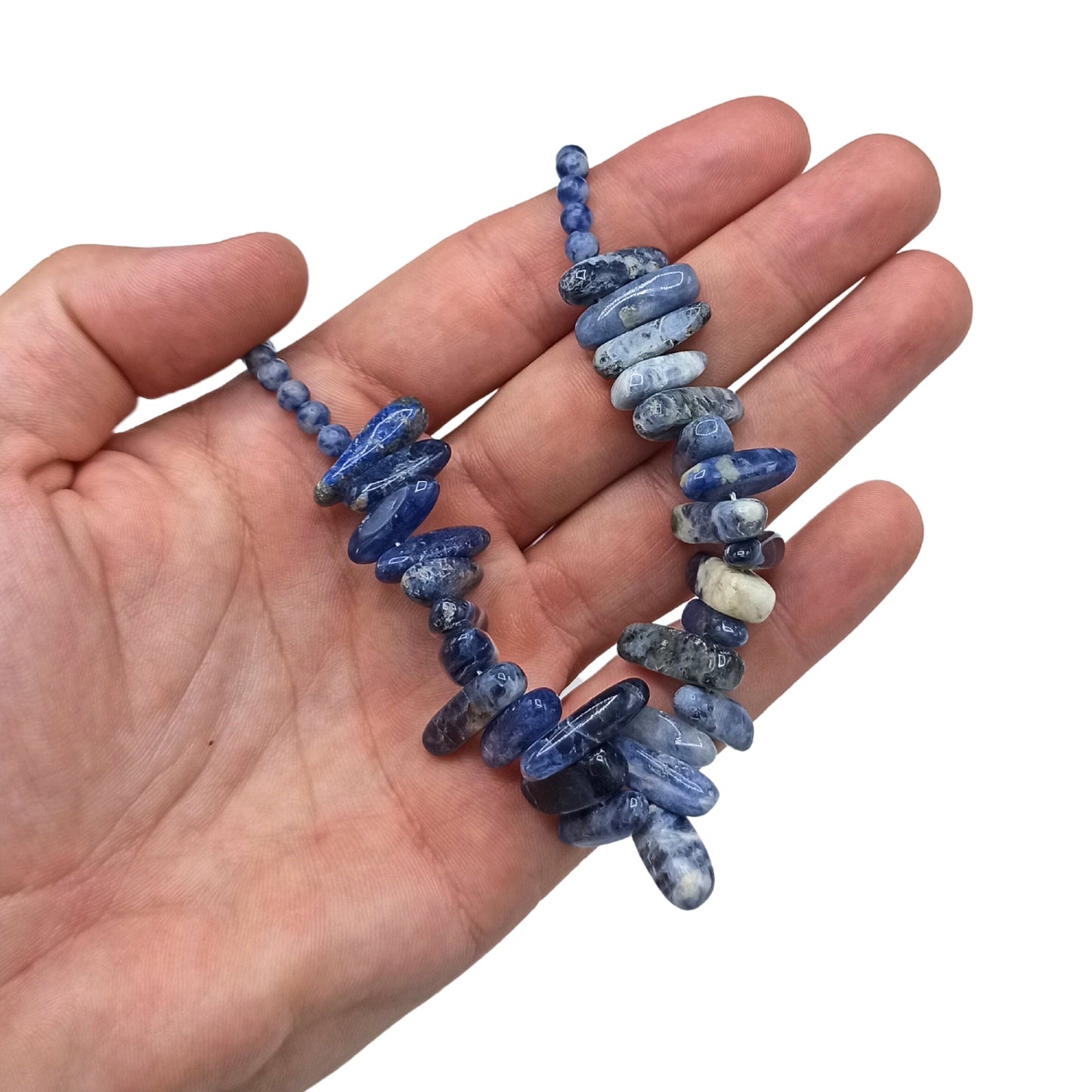 Longstone Gem Necklace - Sodalite product packaging on clean background from Quintessential Holistic Health Ltd