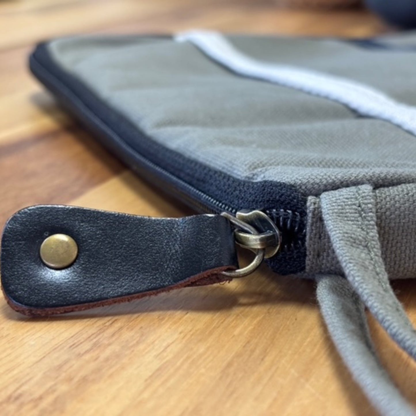 Handcrafted Jute and Cotton Laptop Pouch - Medium / Olive product packaging on clean background from Quintessential Holistic Health Ltd