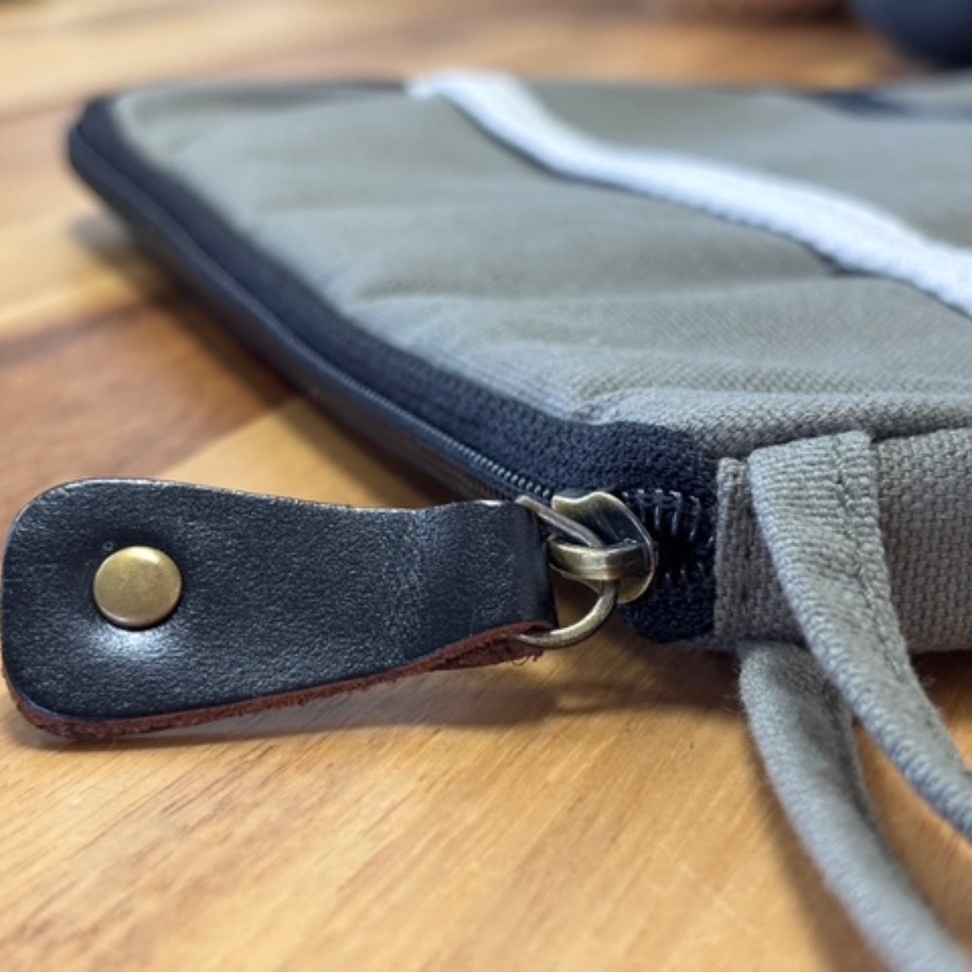 Handcrafted Jute and Cotton Laptop Pouch - Medium / Olive product packaging on clean background from Quintessential Holistic Health Ltd