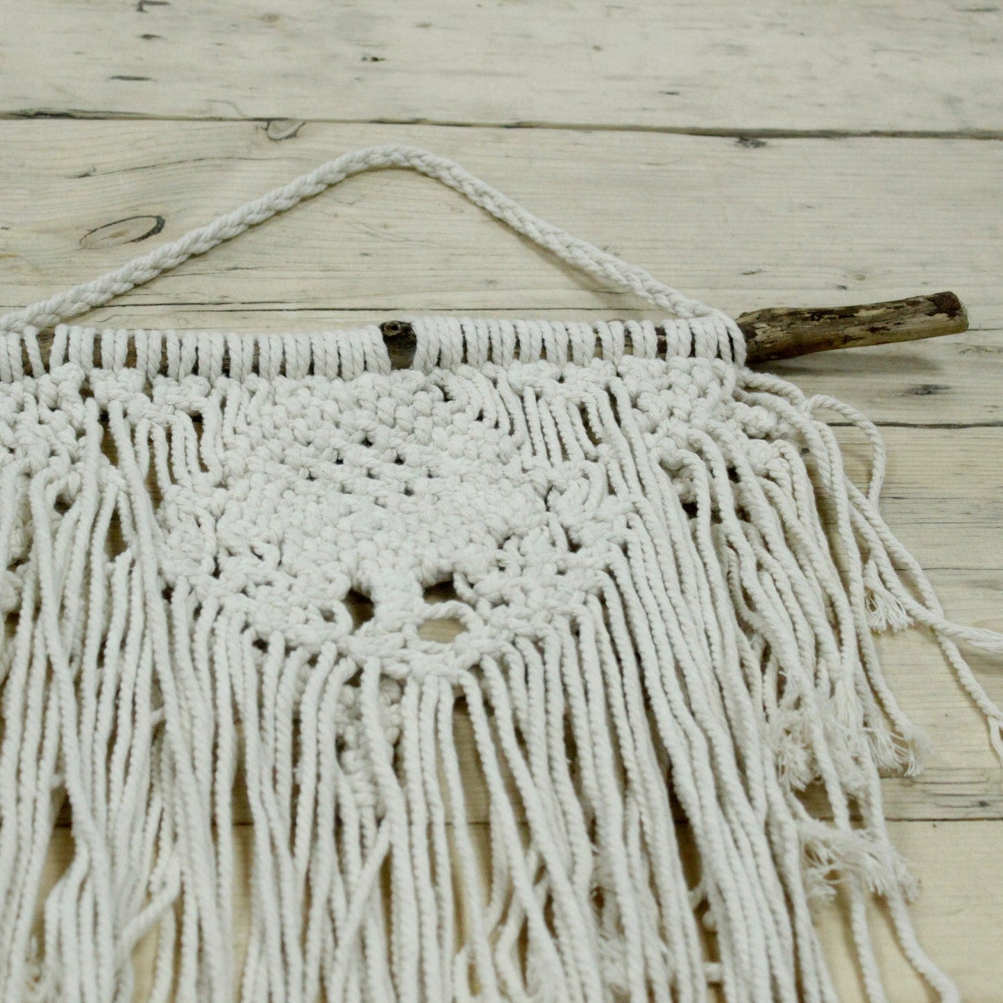 Handcrafted Cotton Macrame Wall Hanging - Home and Heart product packaging on clean background from Quintessential Holistic Health Ltd