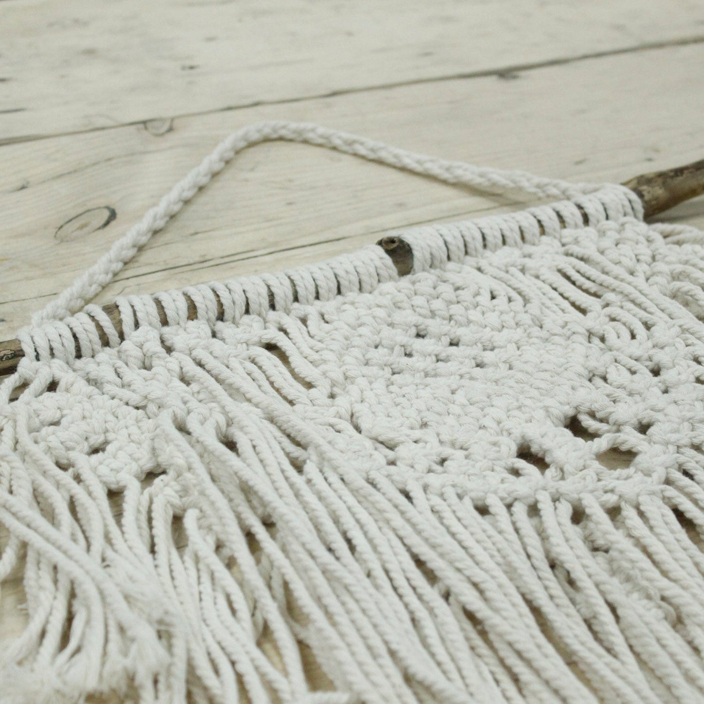 Handcrafted Cotton Macrame Wall Hanging - Home and Heart product packaging on clean background from Quintessential Holistic Health Ltd