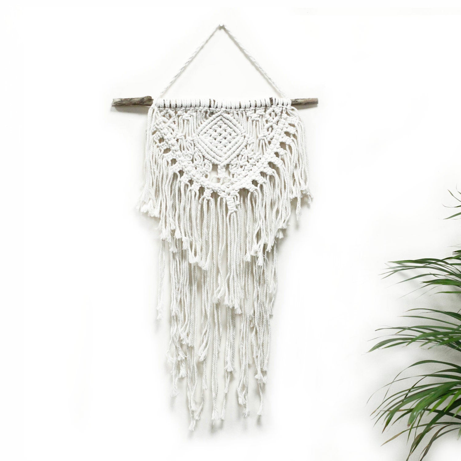 Handcrafted Cotton Macrame Wall Hanging - Home and Heart product packaging on clean background from Quintessential Holistic Health Ltd