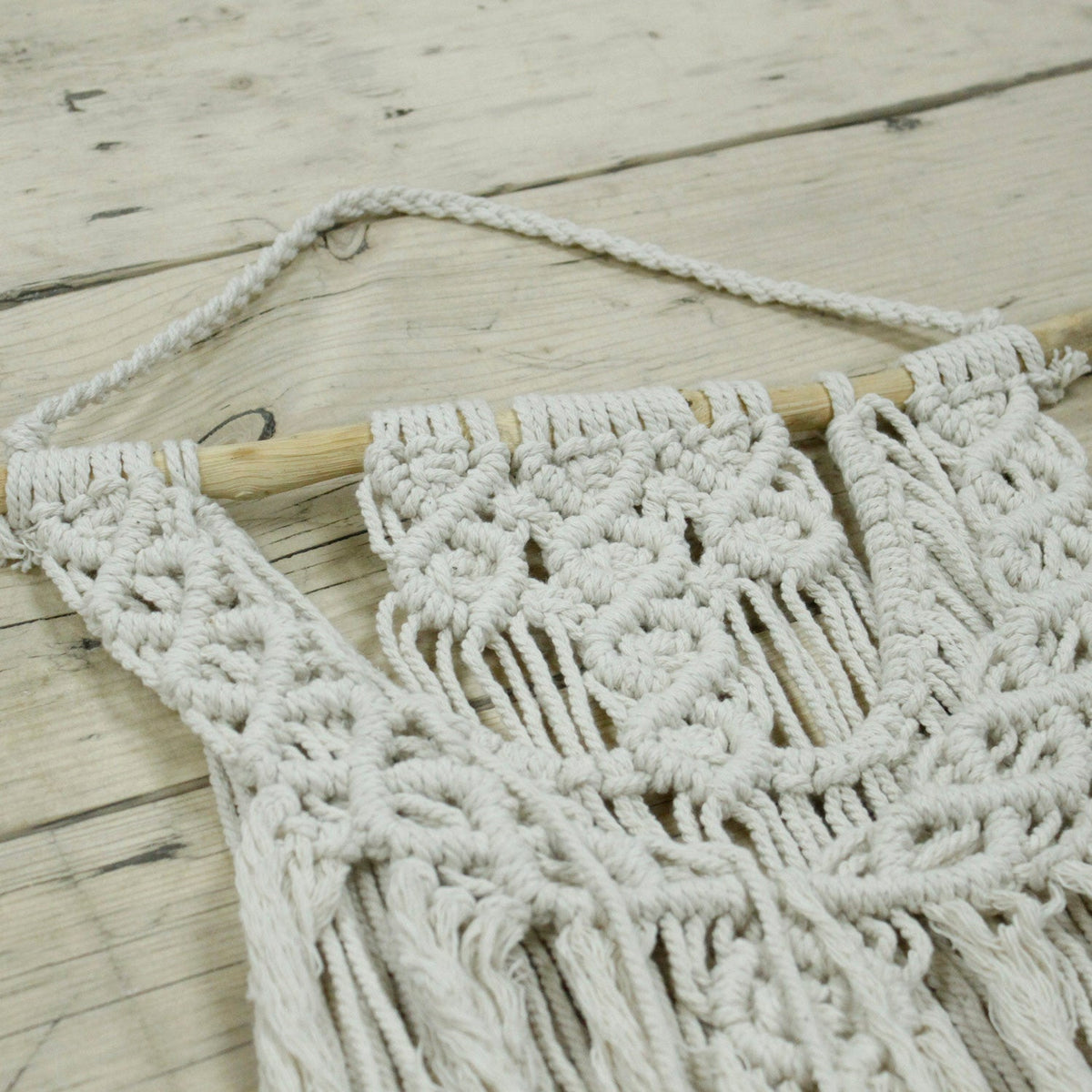 Handcrafted Cotton Macramé Wall Hanging - The Wedding Blessing showing layered geometric knotwork and loose fringe by Quintessential Holistic Health Ltd