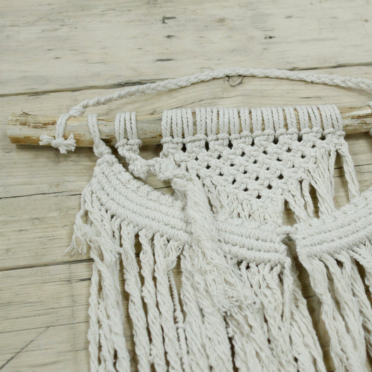 Handcrafted Cotton Macramé Wall Hanging - Force of Nature, close-up of wrapped branch loops, open knotwork and cascading cords by Quintessential Holistic Health Ltd