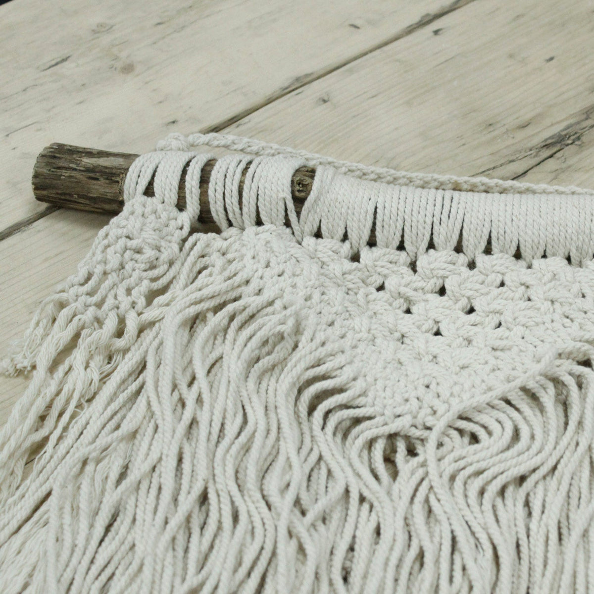 Handcrafted Cotton Macramé Wall Hanging - Natural Abundance, close-up of triangular knotwork, open loops and flowing wavy cords by Quintessential Holistic Health Ltd