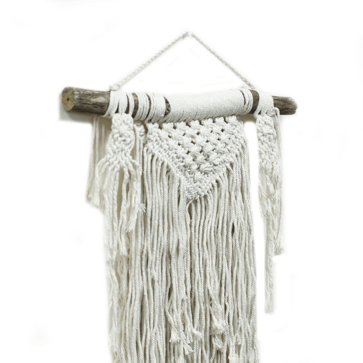 Handcrafted Cotton Macramé Wall Hanging - Natural Abundance, layered chevron knots, twisted cords and long fringe on a branch by Quintessential Holistic Health Ltd