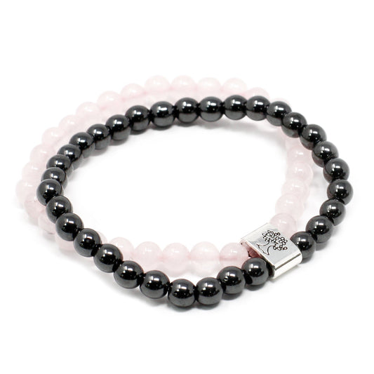 Handcrafted Gemstone Magnetic Bracelet - Rose Quartz / Love and Harmony product packaging on clean background from Quintessential Holistic Health Ltd